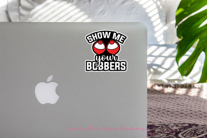 Show Me Your Bobbers sticker on the lid of a silver laptop