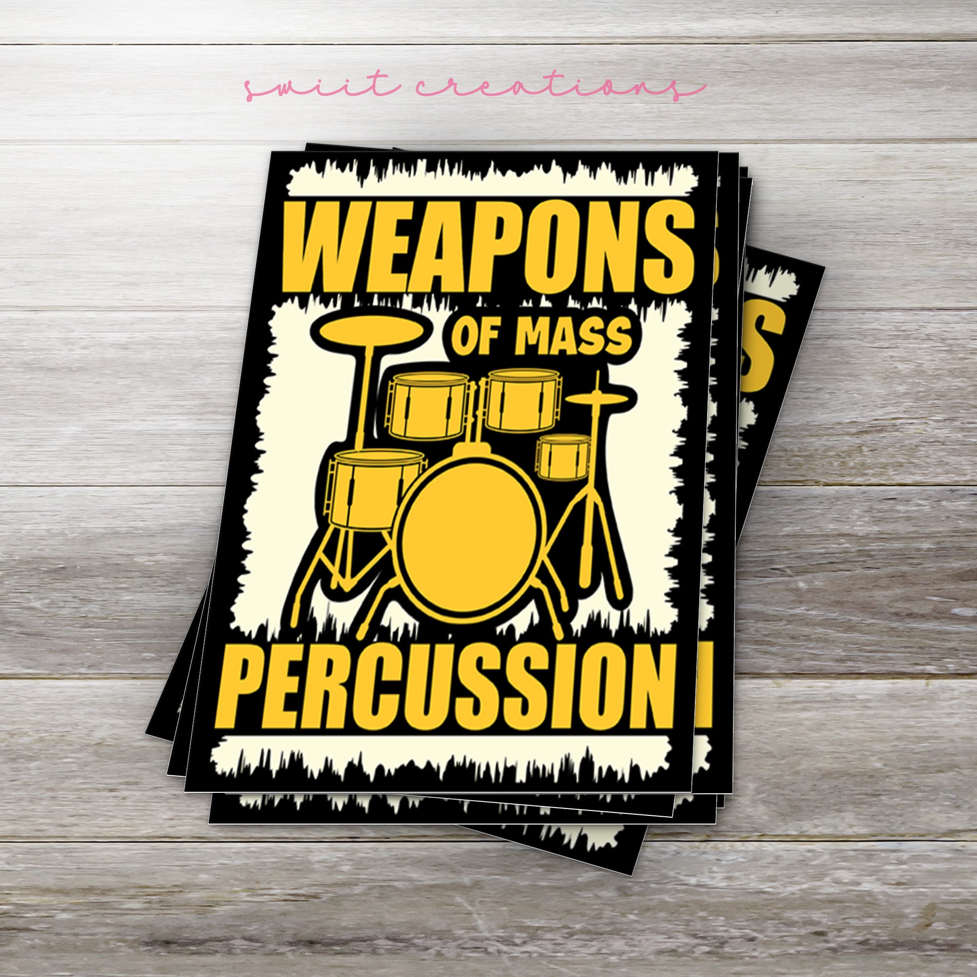 a pair of stickers that say weapons of mass percussion