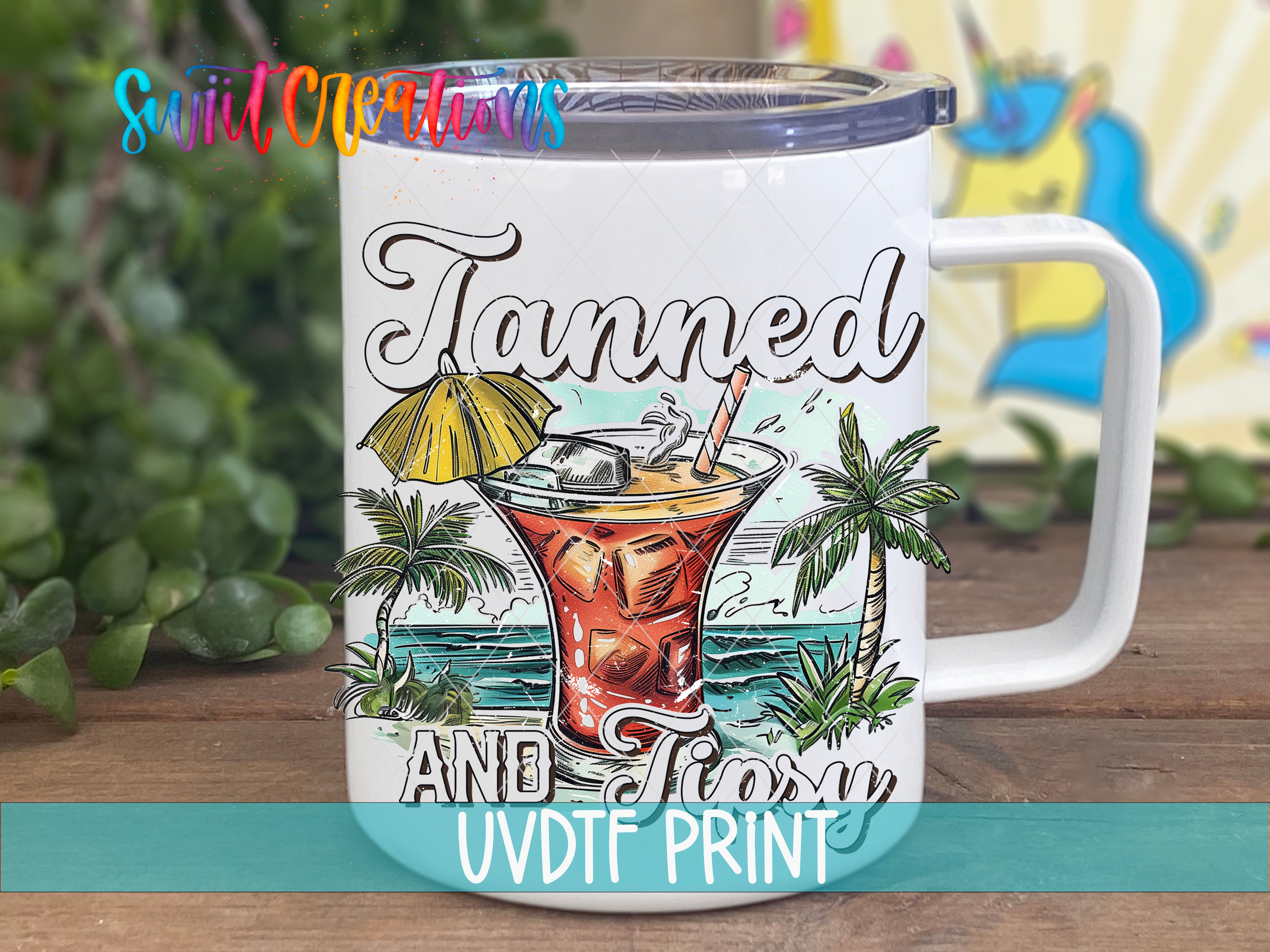 a white coffee mug with a picture of a cocktail on it