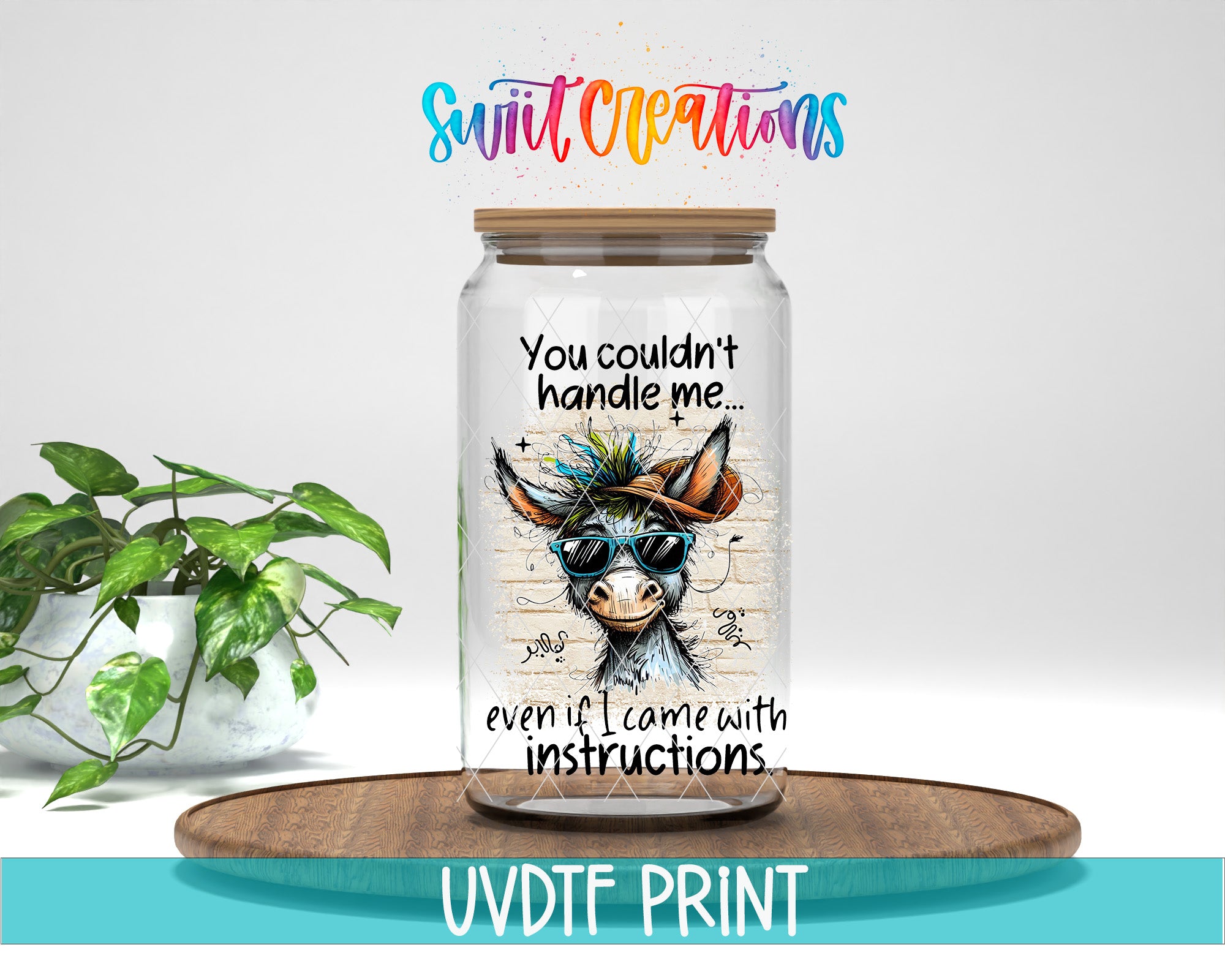 A glass jar with a donkey illustration on it, placed on a wooden surface. The jar has a label that says "You couldn't handle me even if I came with instructions".