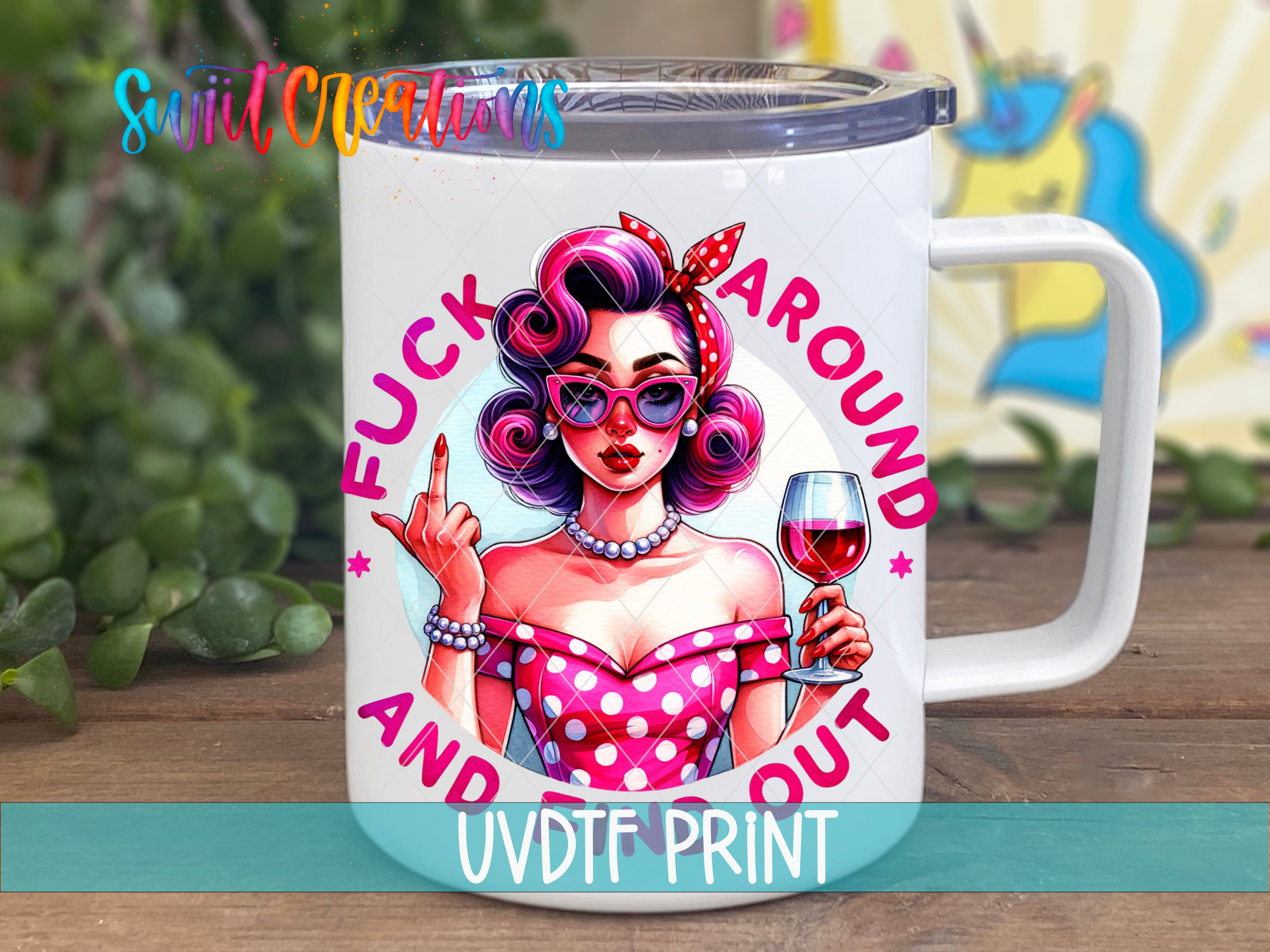 A mug with a colorful illustration of a woman with curly hair, wearing a polka dot dress and holding a wine glass, along with the text "FUCK AROUND AND OUT" and "UVDTFRINT" printed on it.