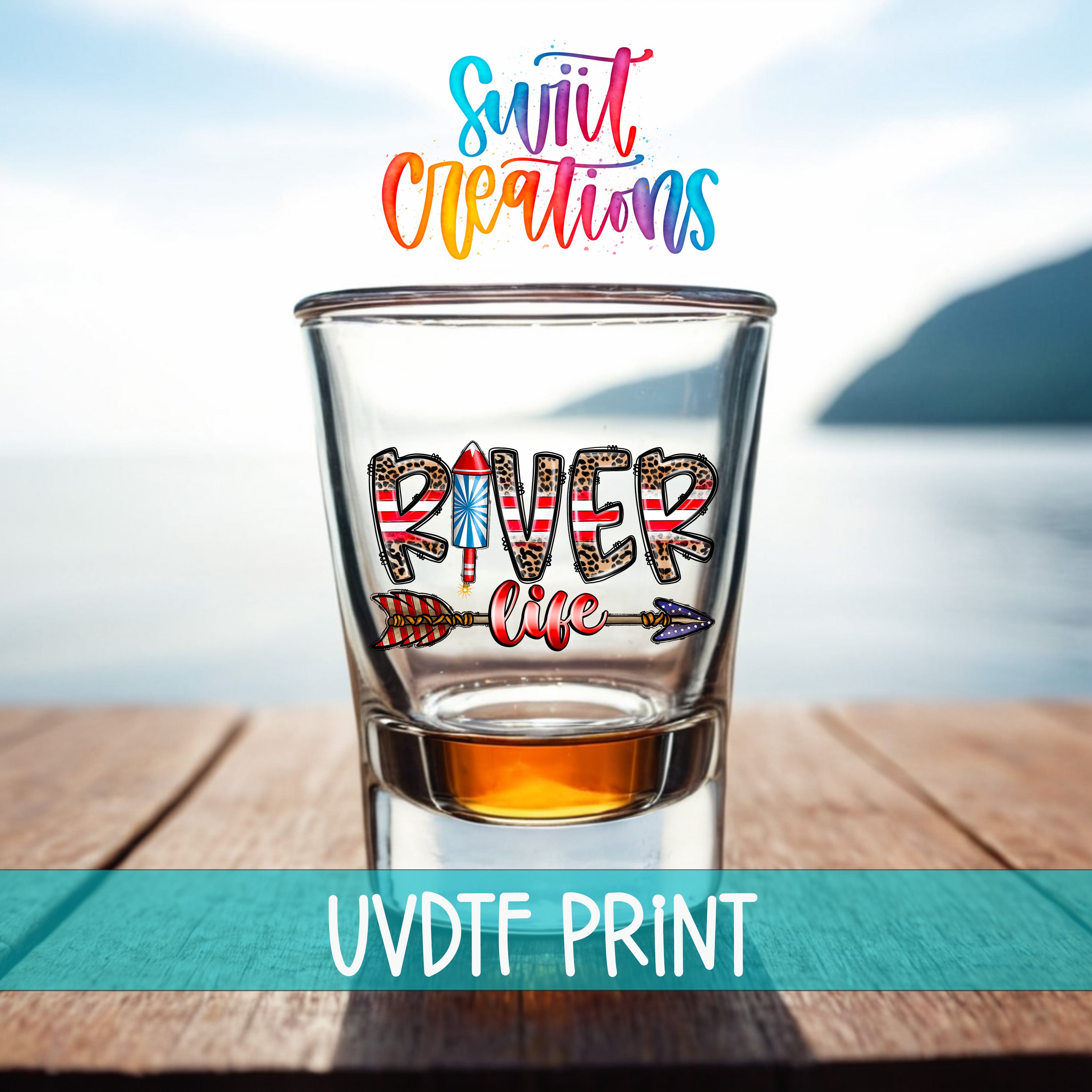 A shot glass with the word "RIVER" printed on it, placed on a wooden surface with a body of water in the background.