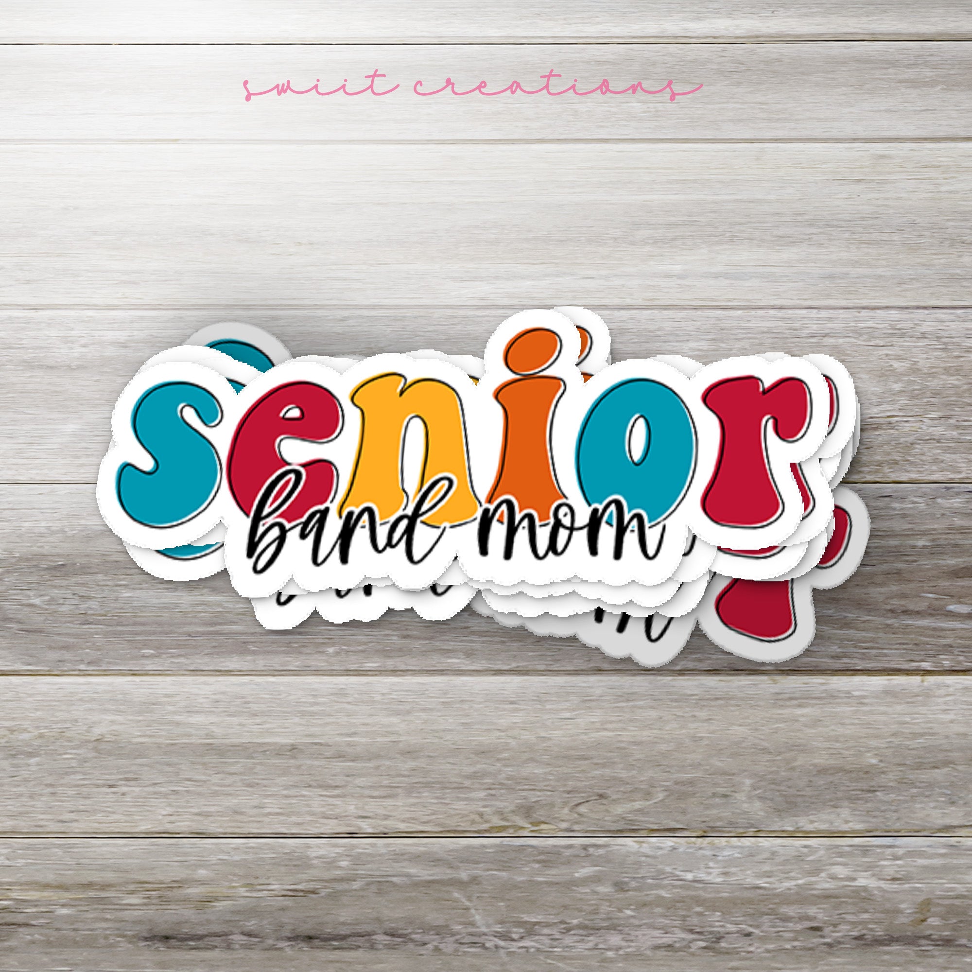 a bunch of stickers that are on a table
