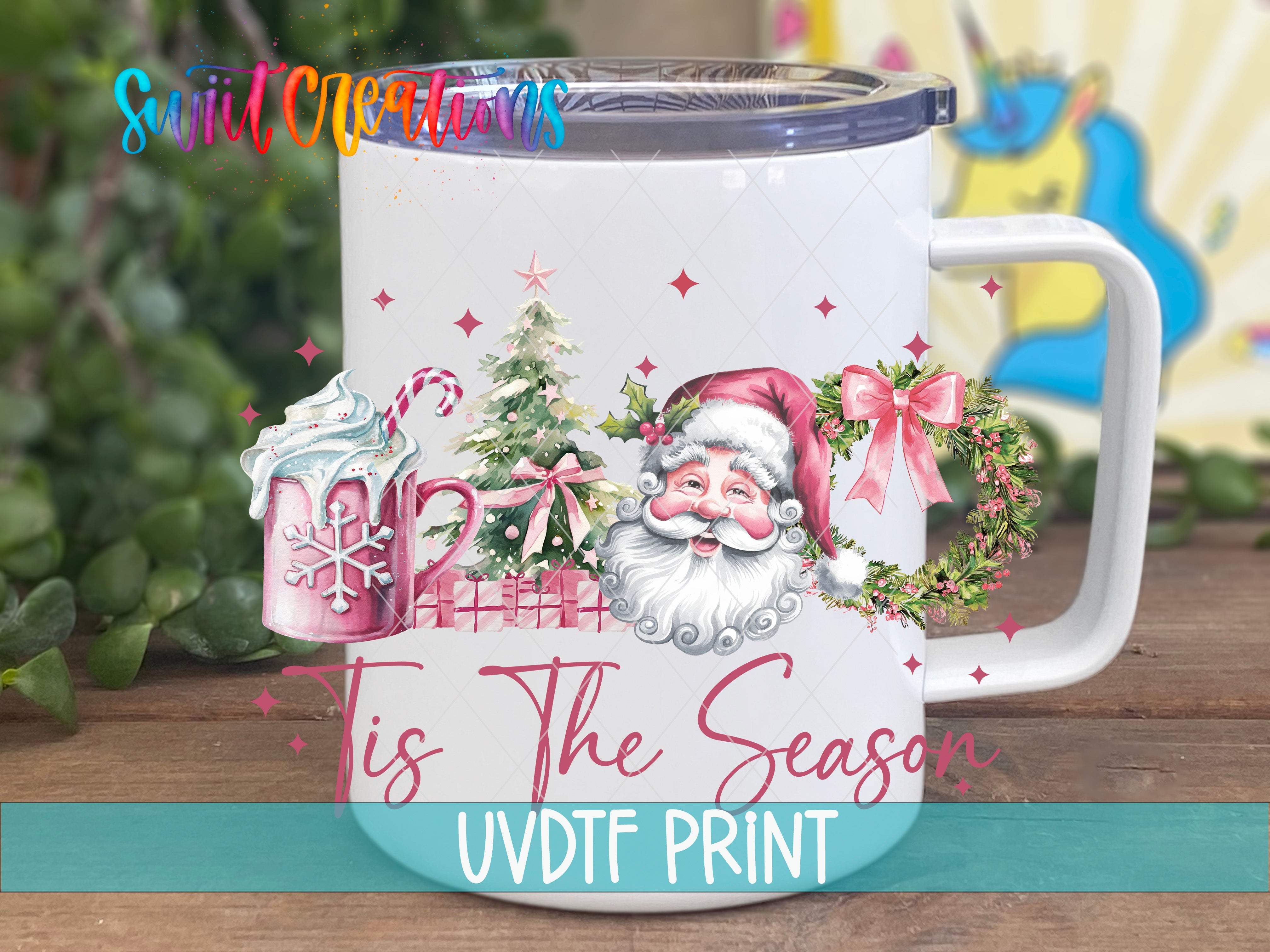 a white coffee mug with a santa clause on it