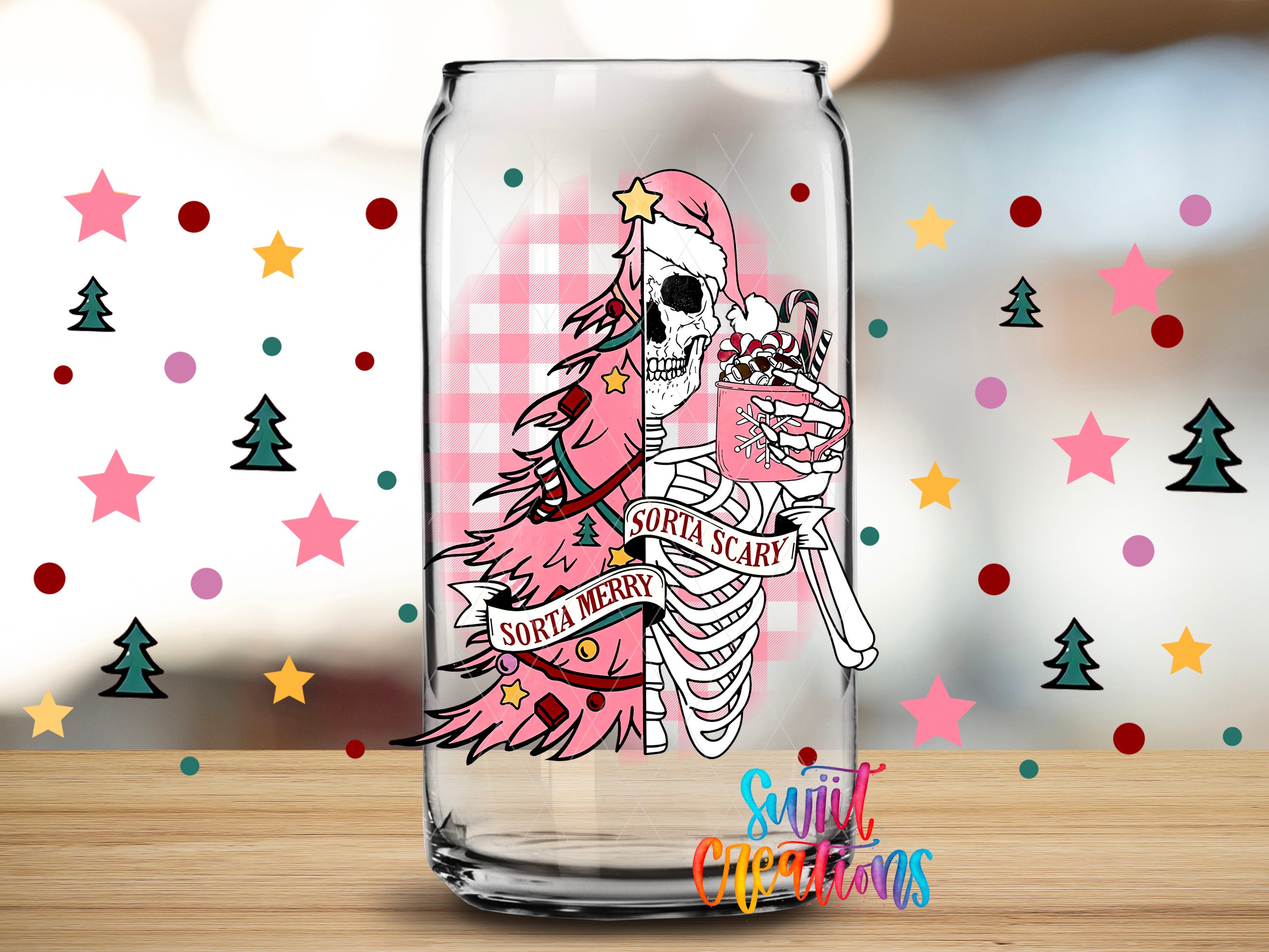 A glass can with a Christmas-themed design featuring a skeleton wearing a Santa hat and holding a cup of hot chocolate, surrounded by festive decorations and stars.