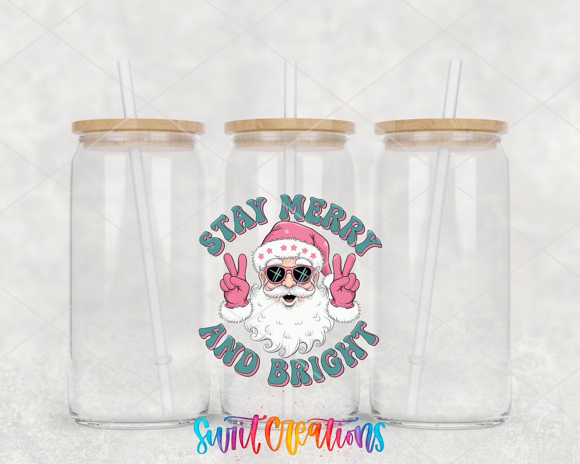 two clear tumblers with santa claus on them