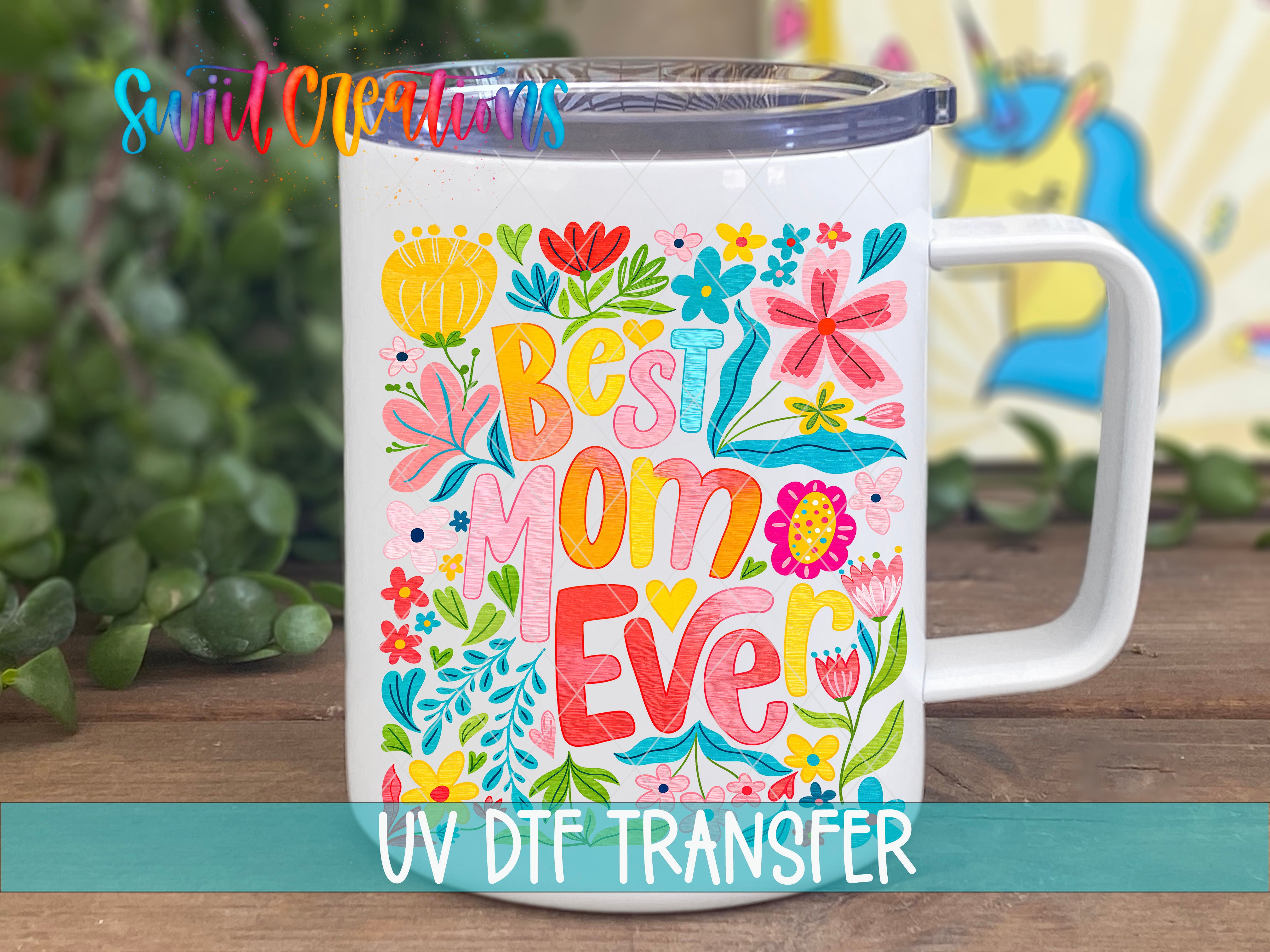 A white ceramic mug with a colorful floral design and the text "Best Mom Ever" printed on it.