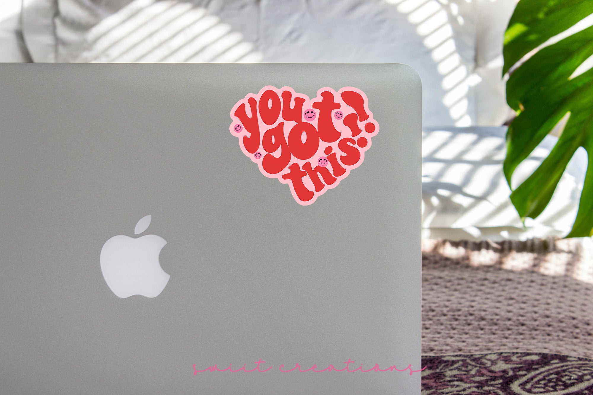 a laptop computer with a sticker on it