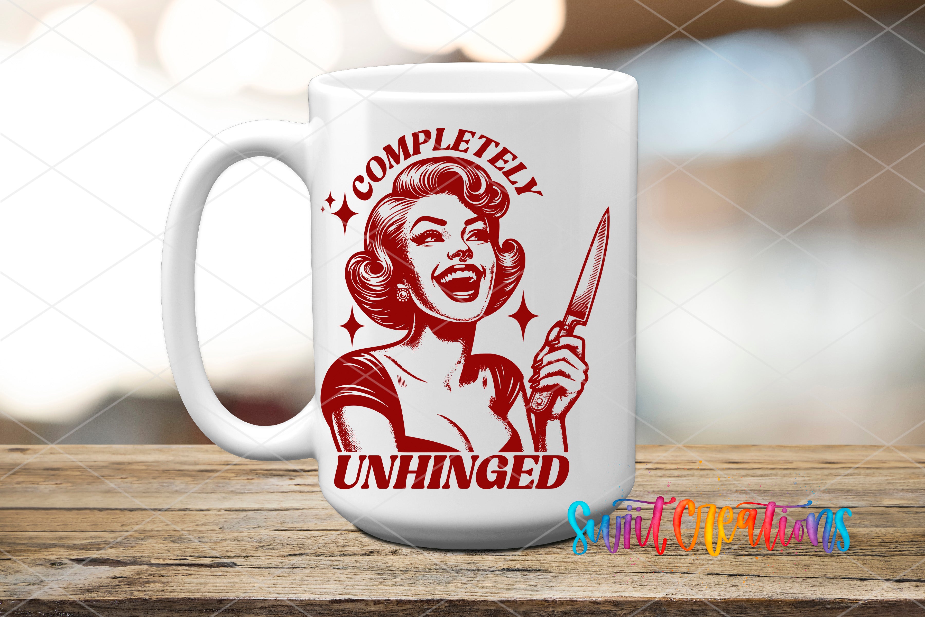 A white ceramic mug with a red graphic design featuring a smiling woman holding a knife and the text "COMPLETELY UNHINGED" printed on it.