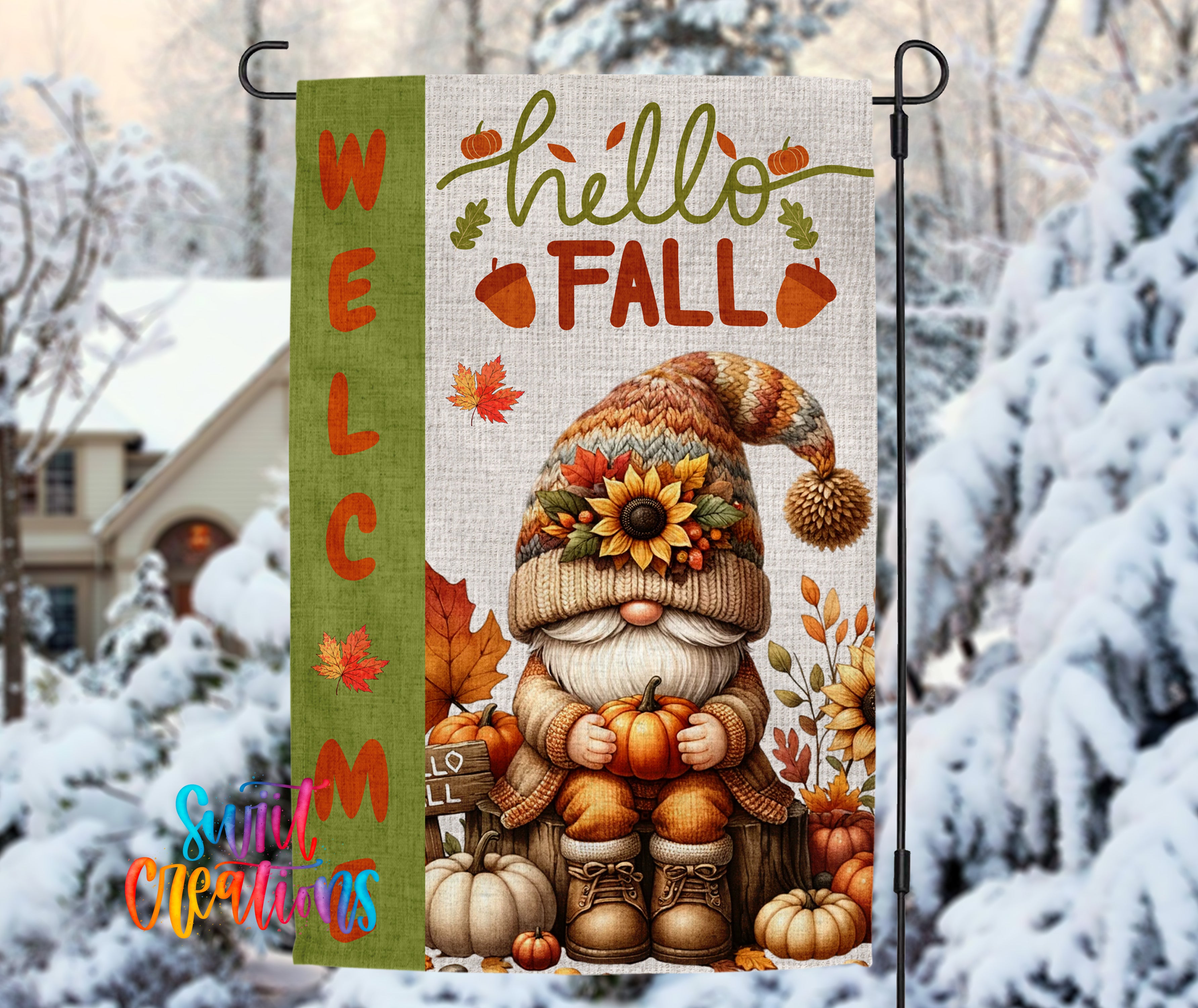 A colorful autumn-themed welcome sign featuring a gnome holding pumpkins and surrounded by fall decorations, with a snowy background.