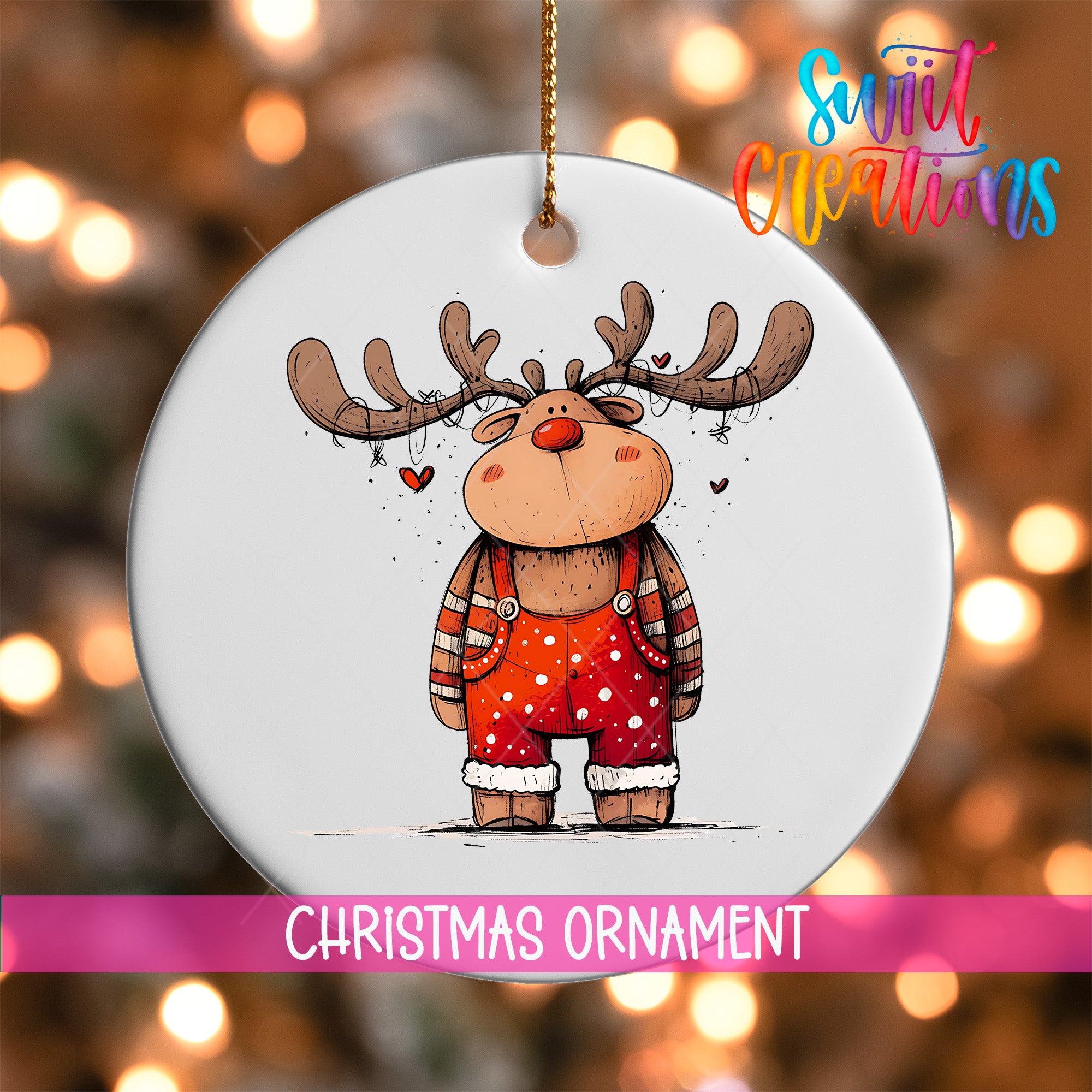 A white Christmas ornament featuring a cartoon reindeer wearing red overalls with white polka dots and antlers.