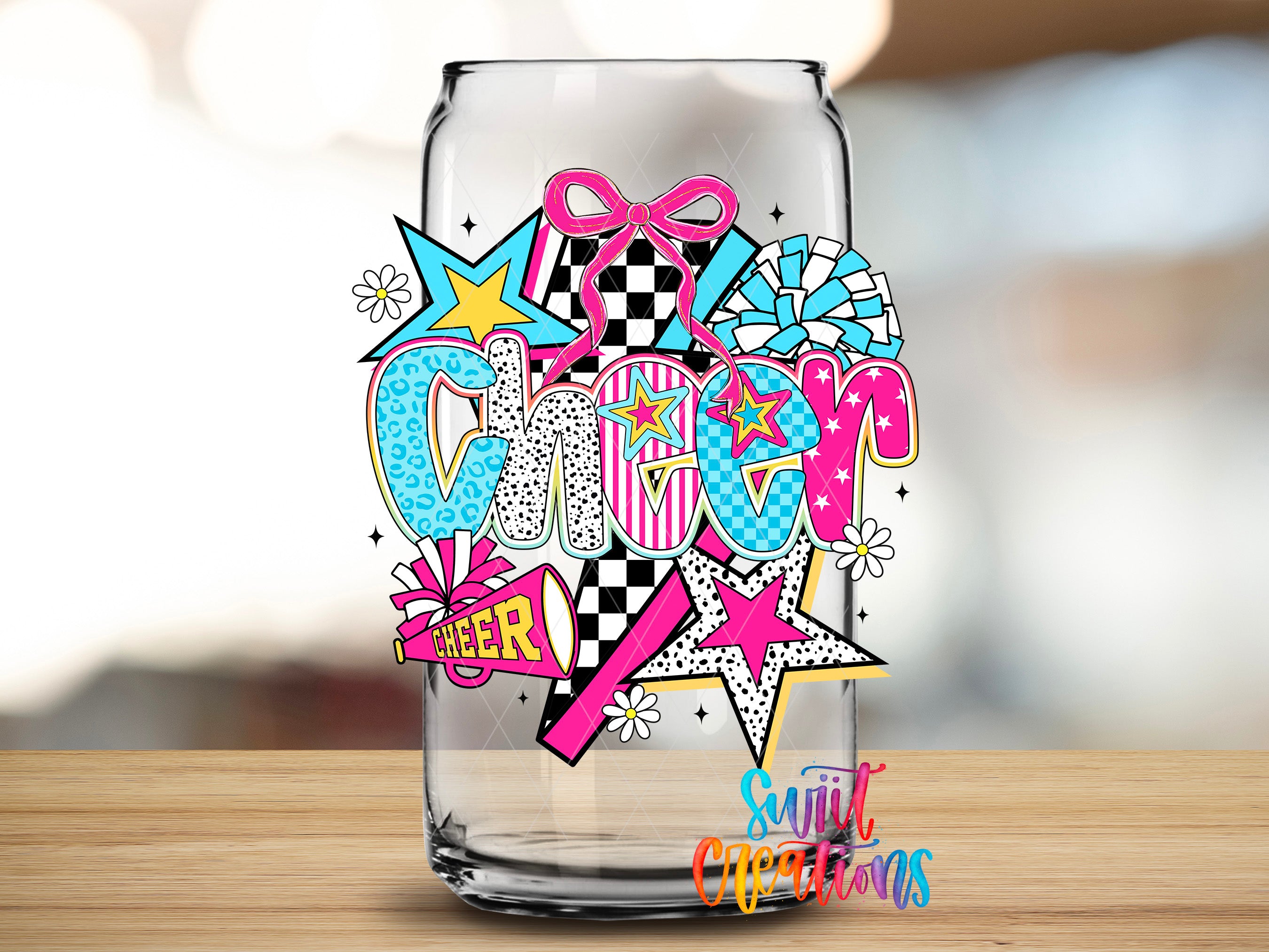 A glass can with a colorful and vibrant design featuring the word "Cheer" surrounded by various decorative elements such as stars, flowers, and a checkered pattern.