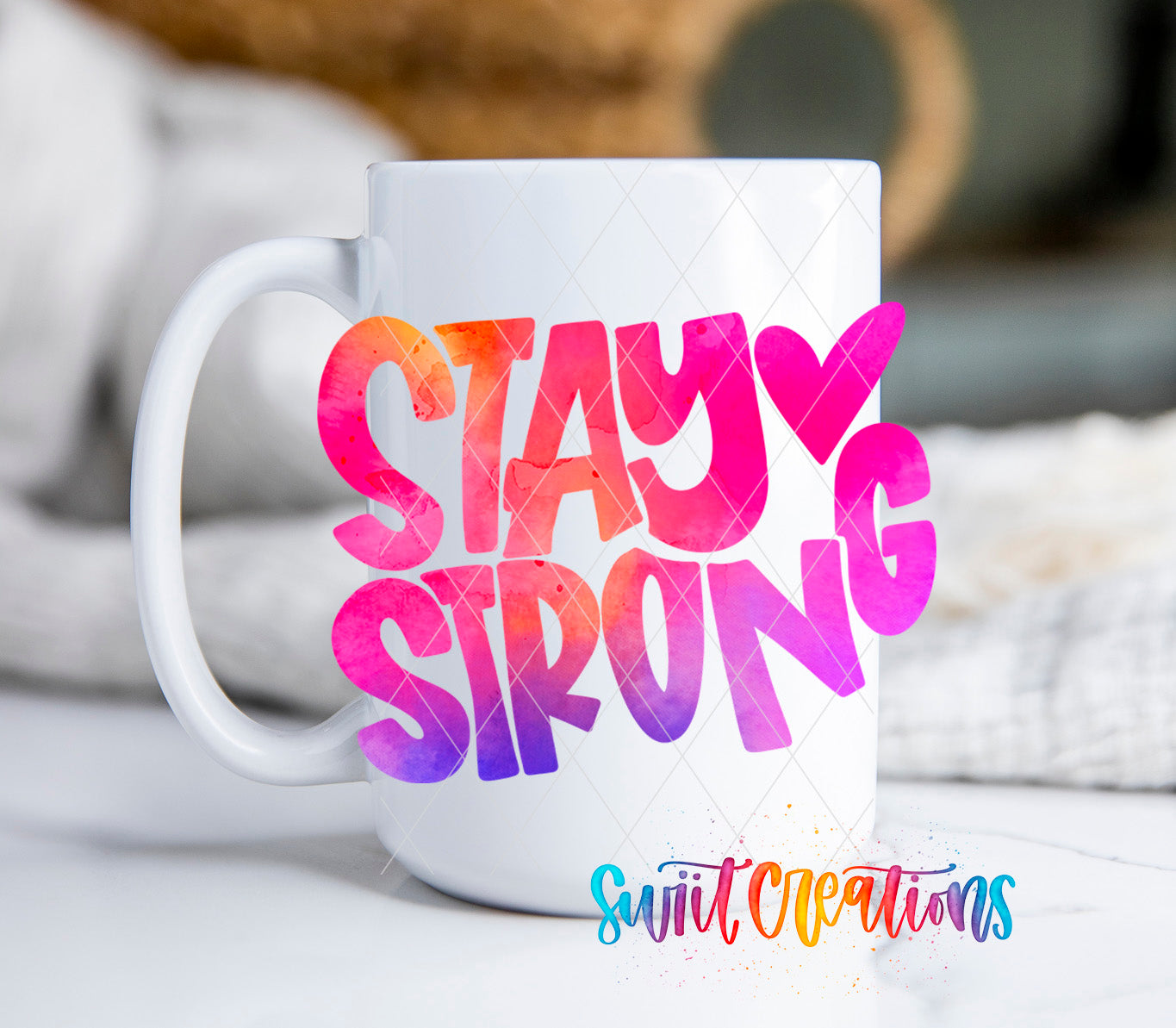 a white coffee mug with the words stay strong on it