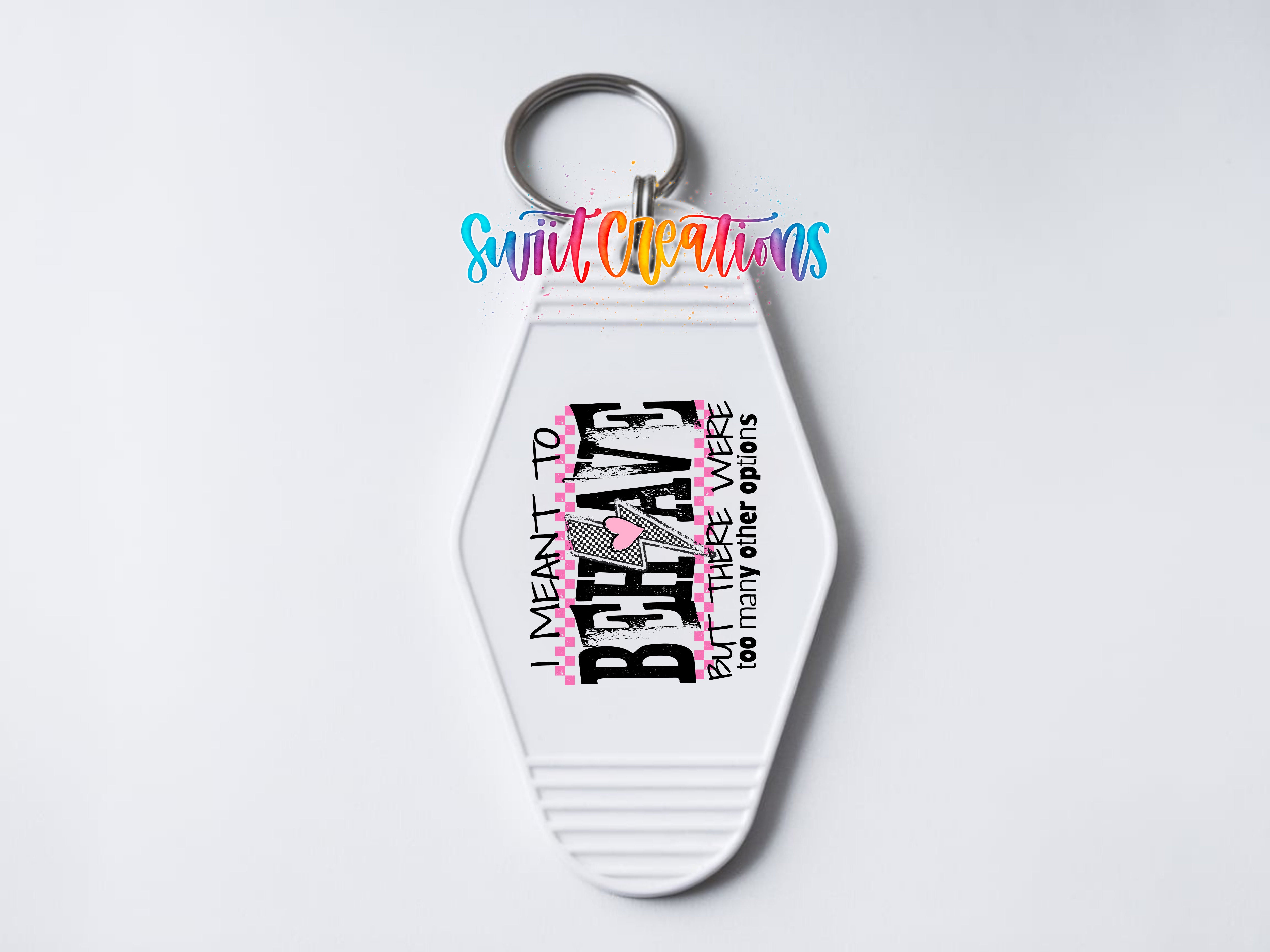 A white keychain with a keyring and text printed on it.