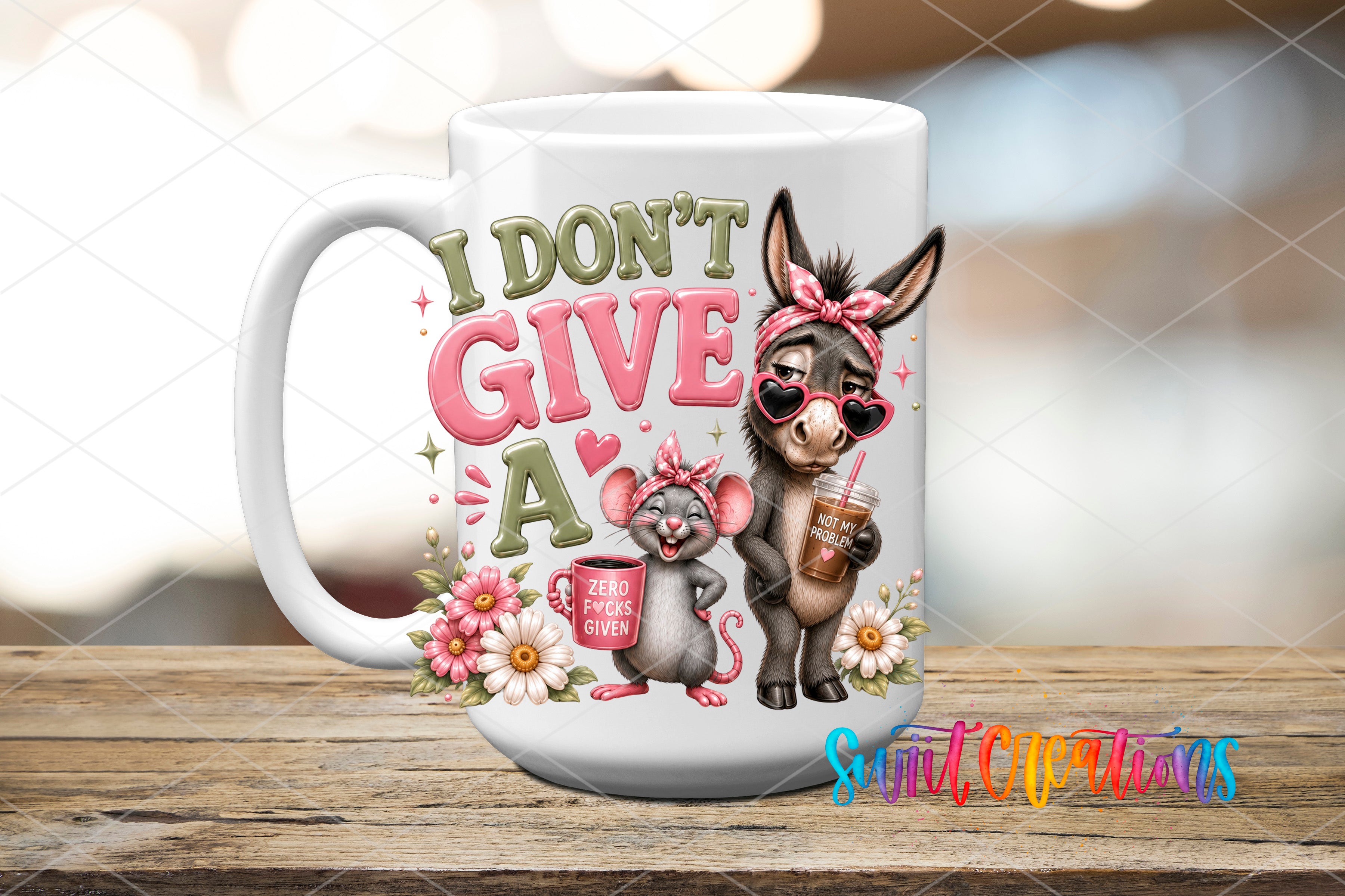 A white mug with a colorful design featuring a donkey and a mouse, along with the text "I DON'T GIVE A".
