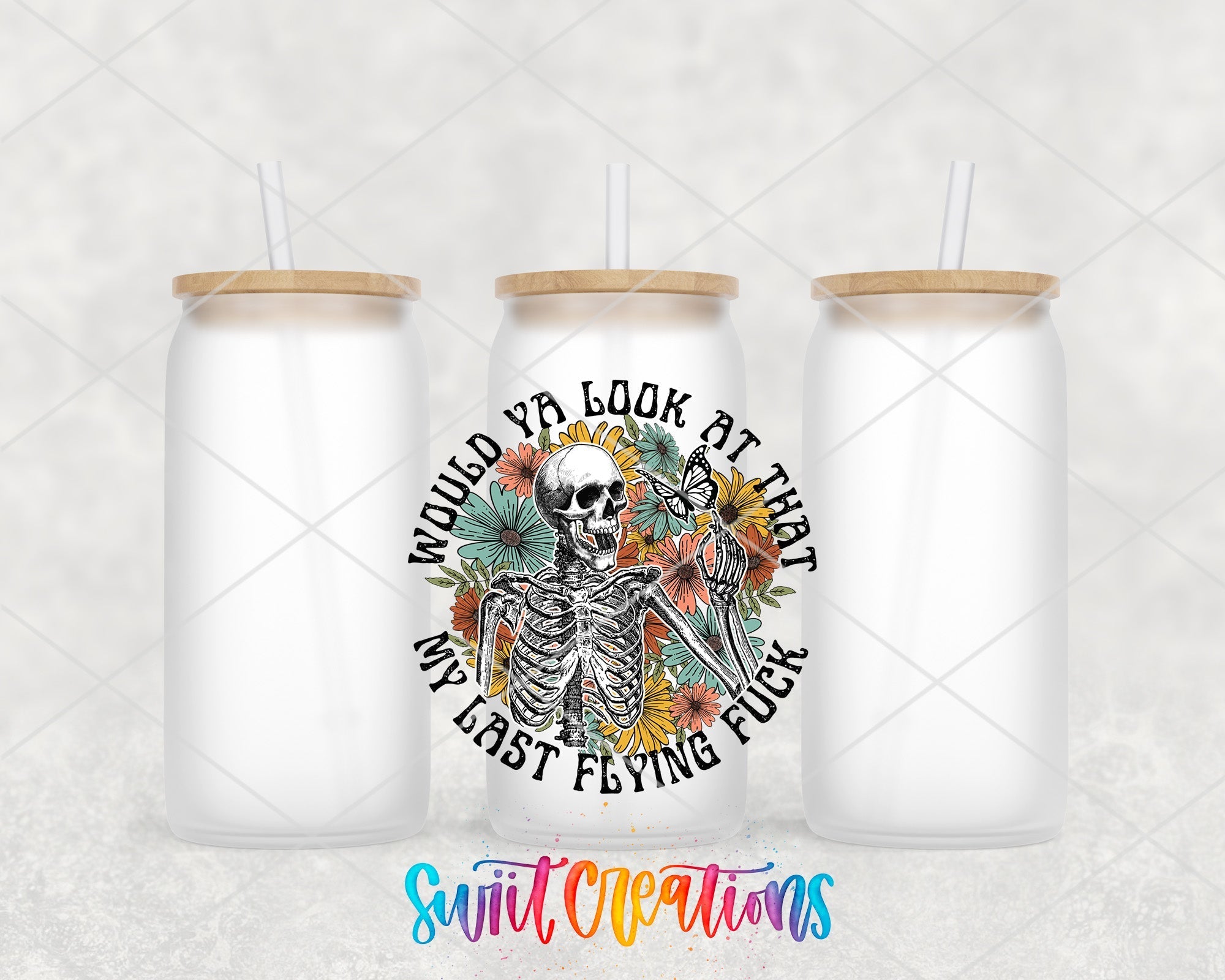 a couple of white mason jars with a skeleton on them