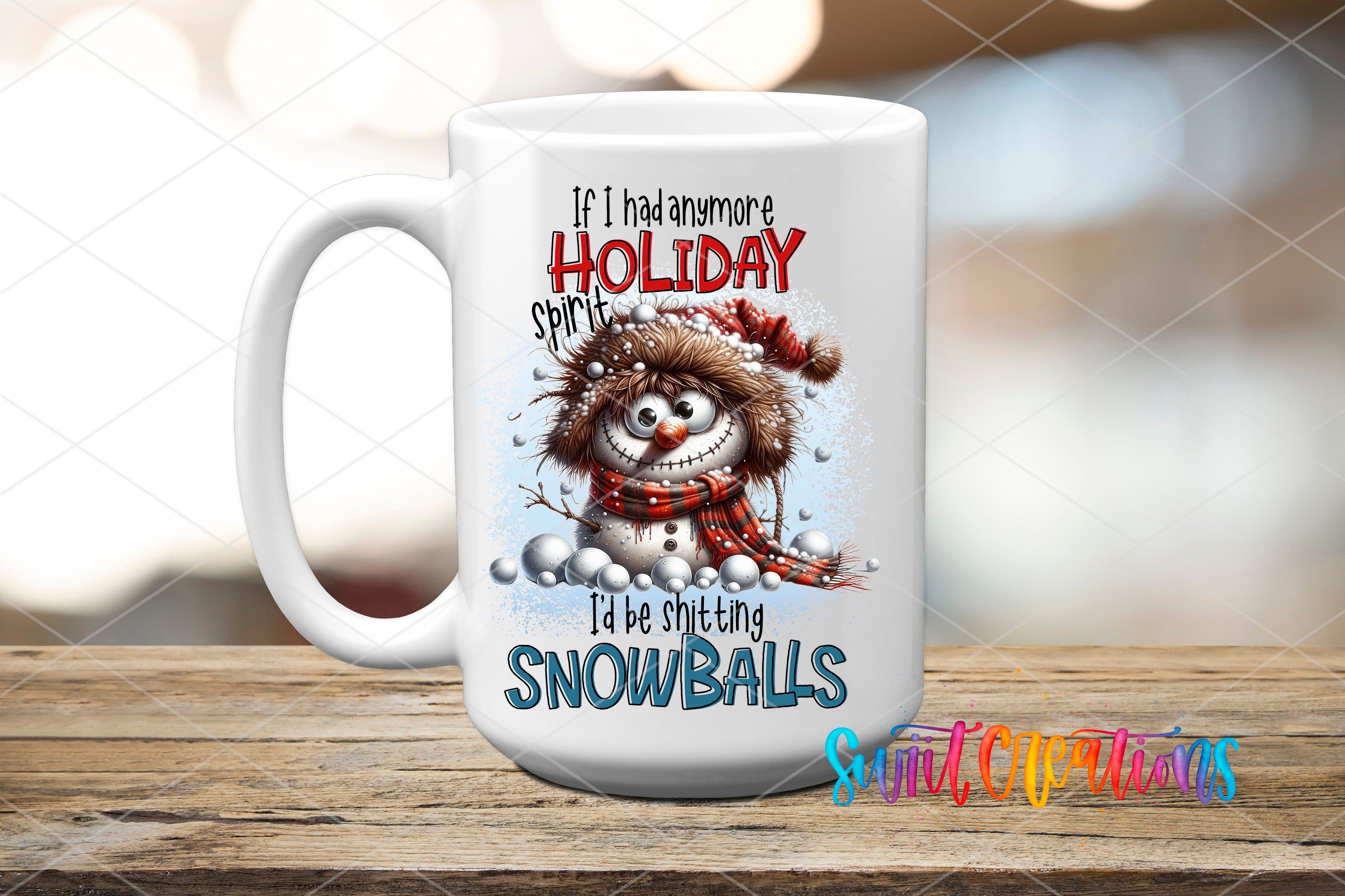 A white mug with a snowman design and text on it, placed on a wooden surface.