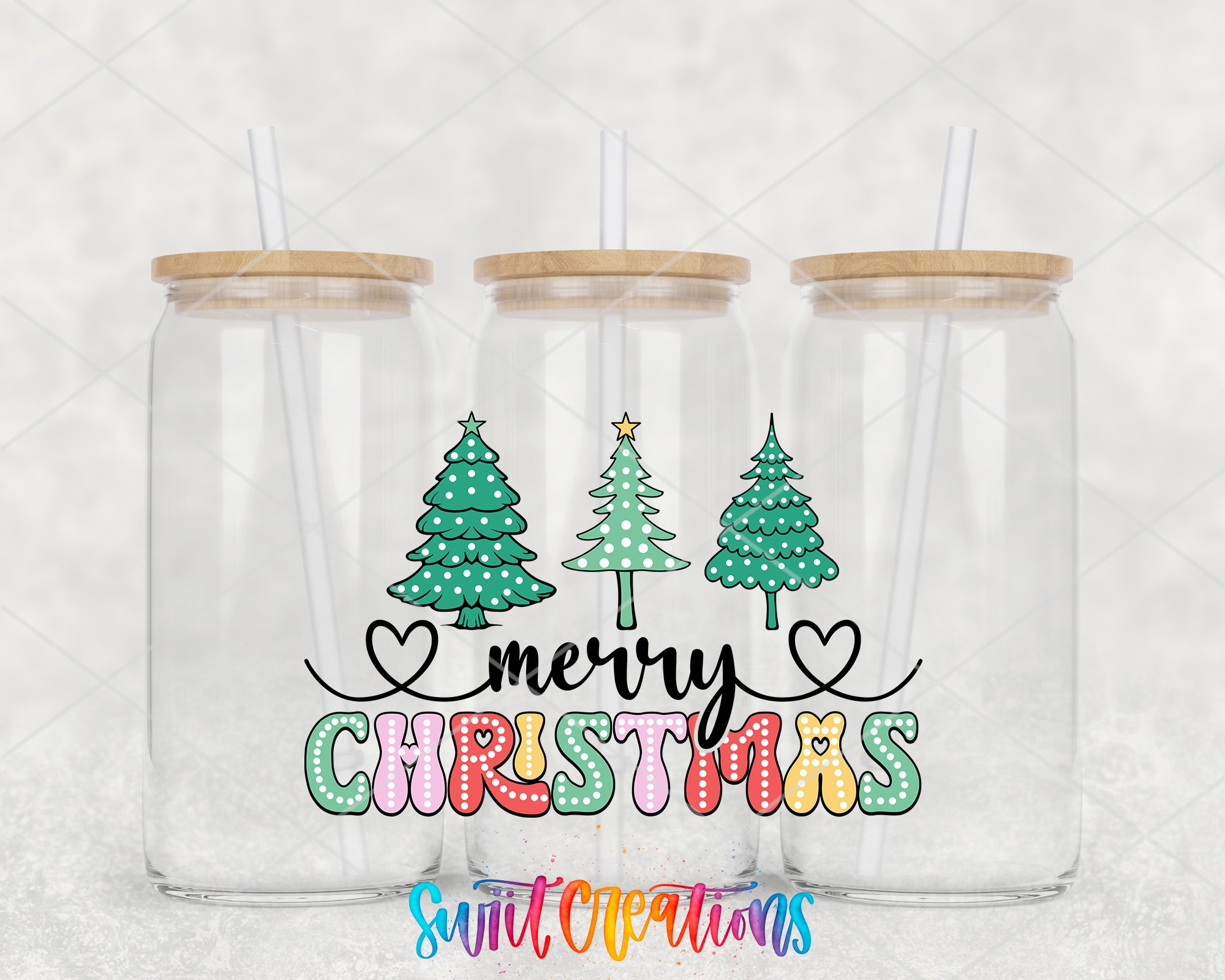 two clear tumblers with merry christmas designs on them