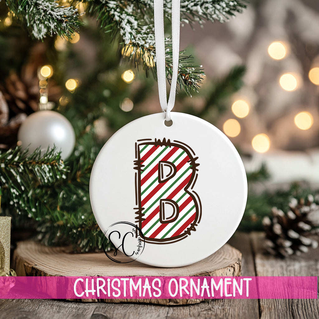 a christmas ornament hanging from a christmas tree
