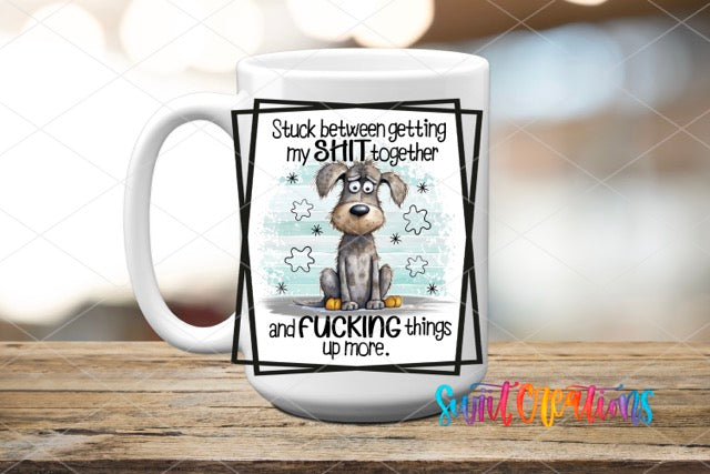 a white coffee mug with a dog on it