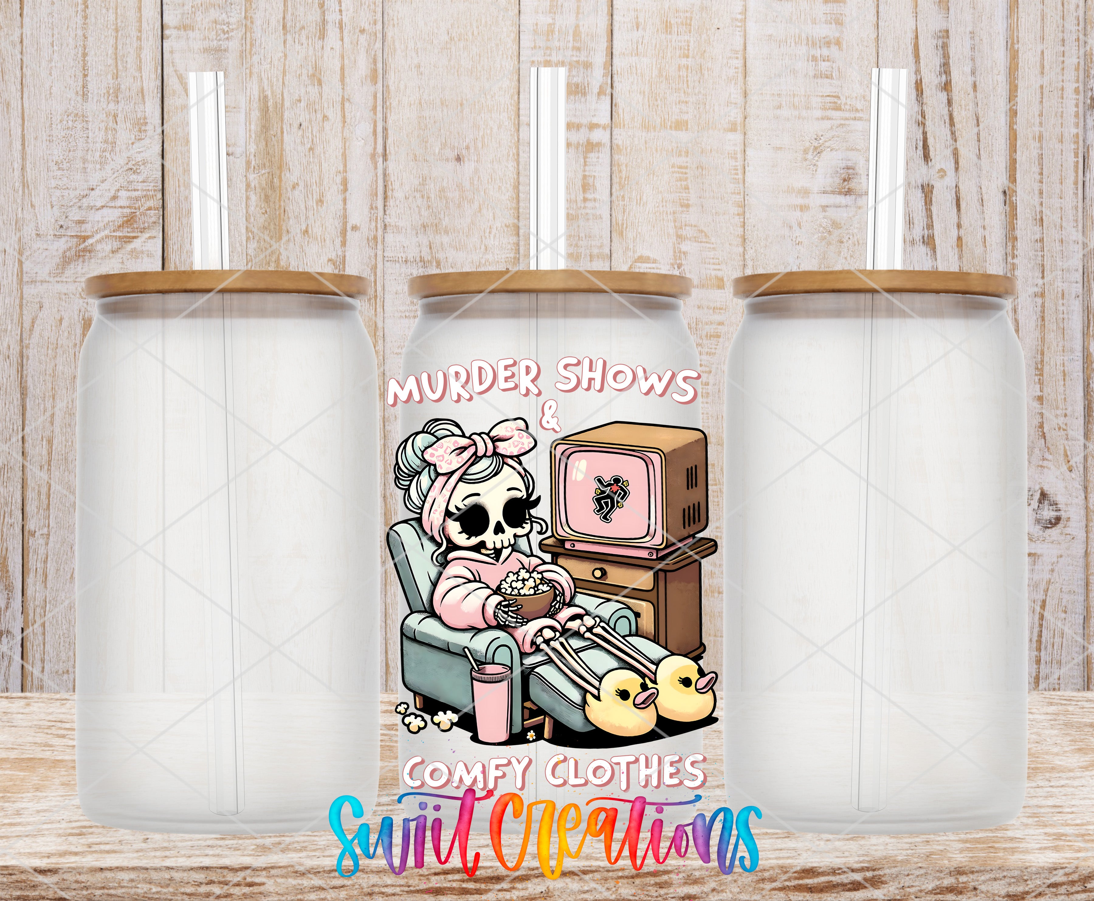 a cartoon illustration of a skeleton wearing a pink outfit and holding a cup of coffee, with the text "Murder Shows & Comfy Clothes" and "Suite Creations" below the illustration.