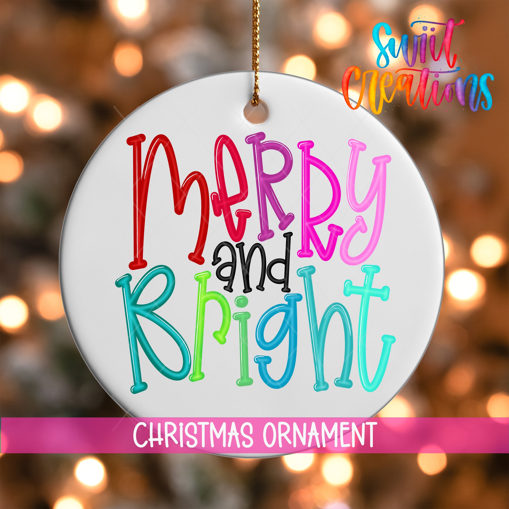 A white Christmas ornament with the text "Merry and Bright" written in colorful, stylized letters.