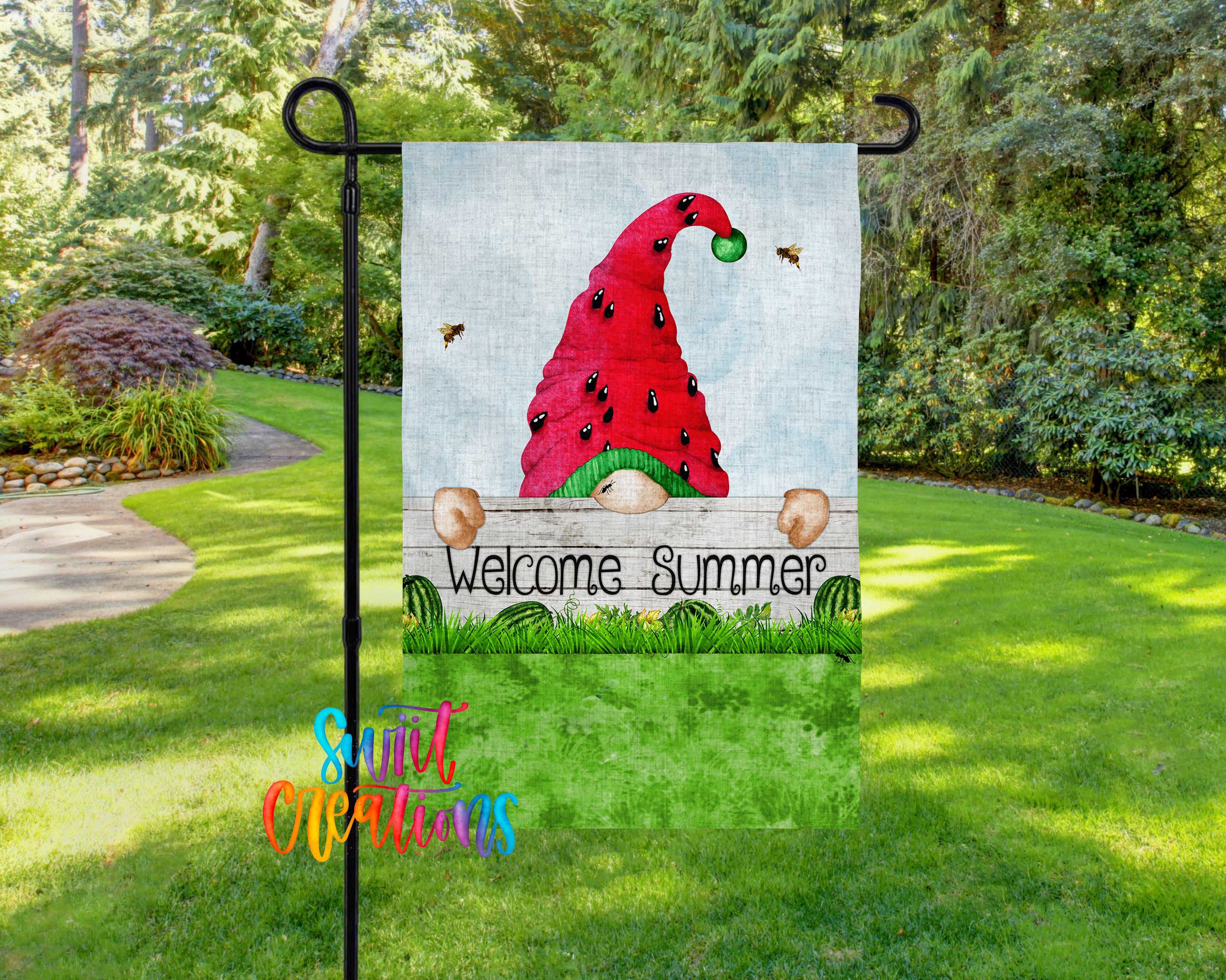 A garden gnome sign with a red hat and a green ball, surrounded by a grassy area with trees in the background.