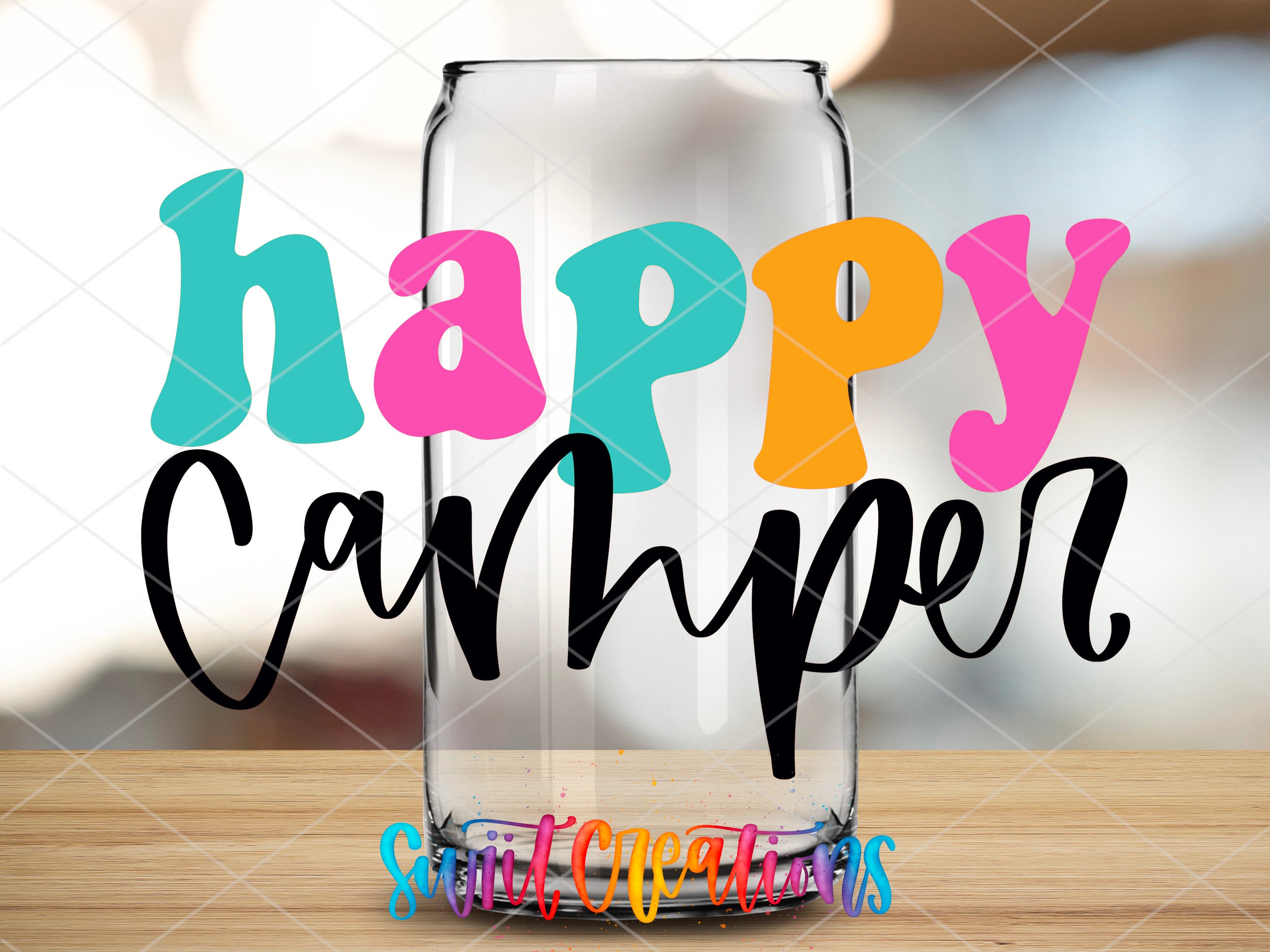 a glass with the words happy camper on it
