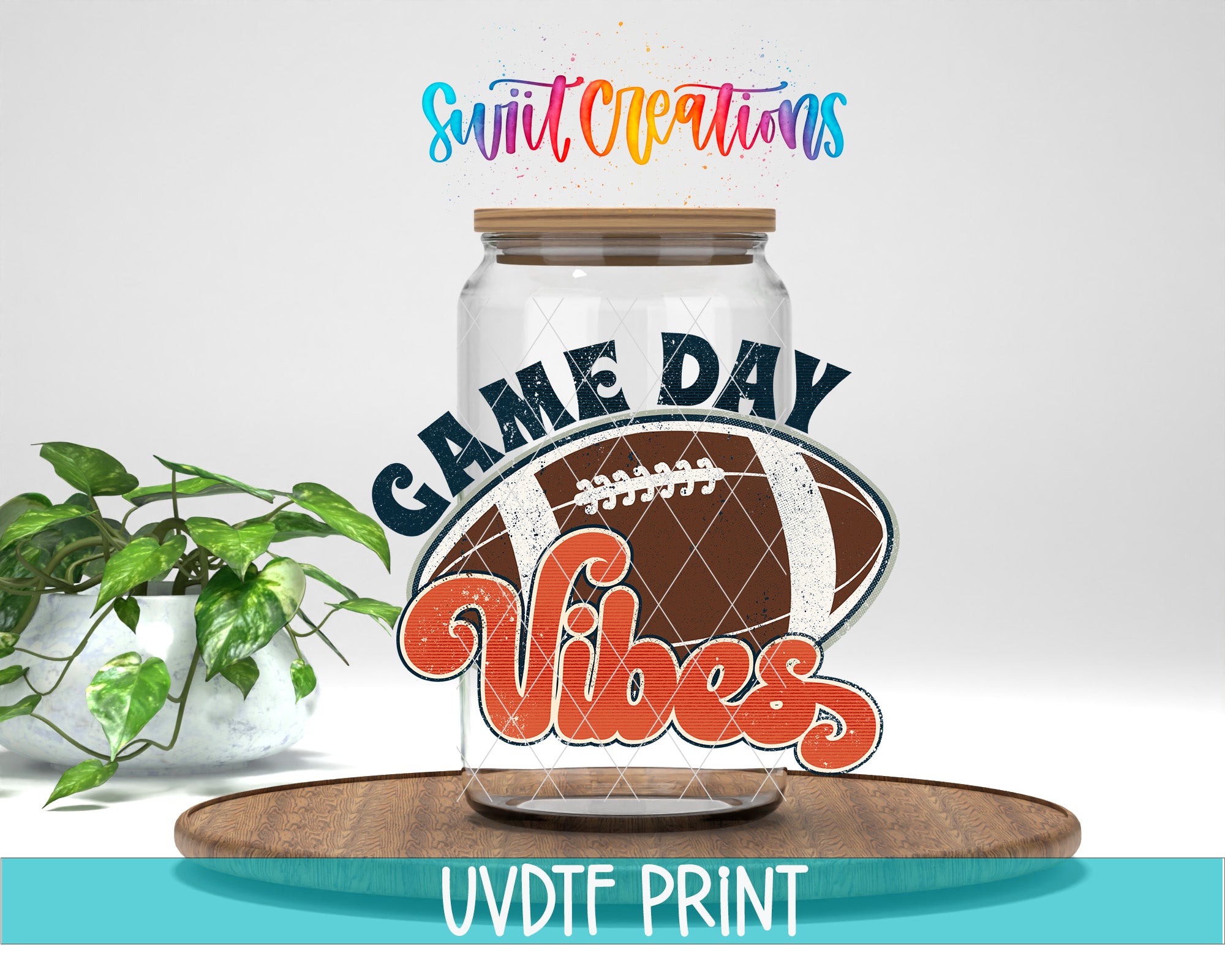 a glass jar with a football inside, surrounded by text that says "GAME DAY VIBES" and "Swit Creations".