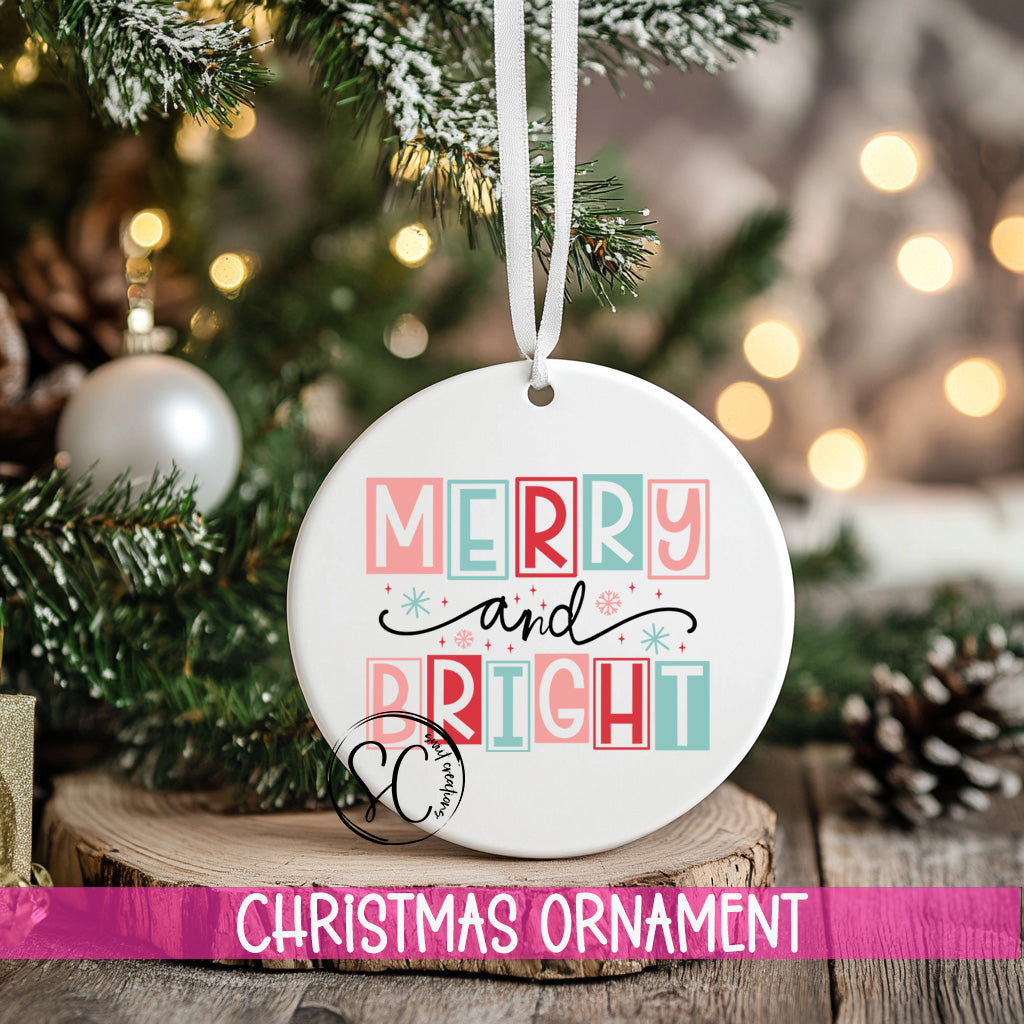 a merry and bright ornament hanging from a christmas tree
