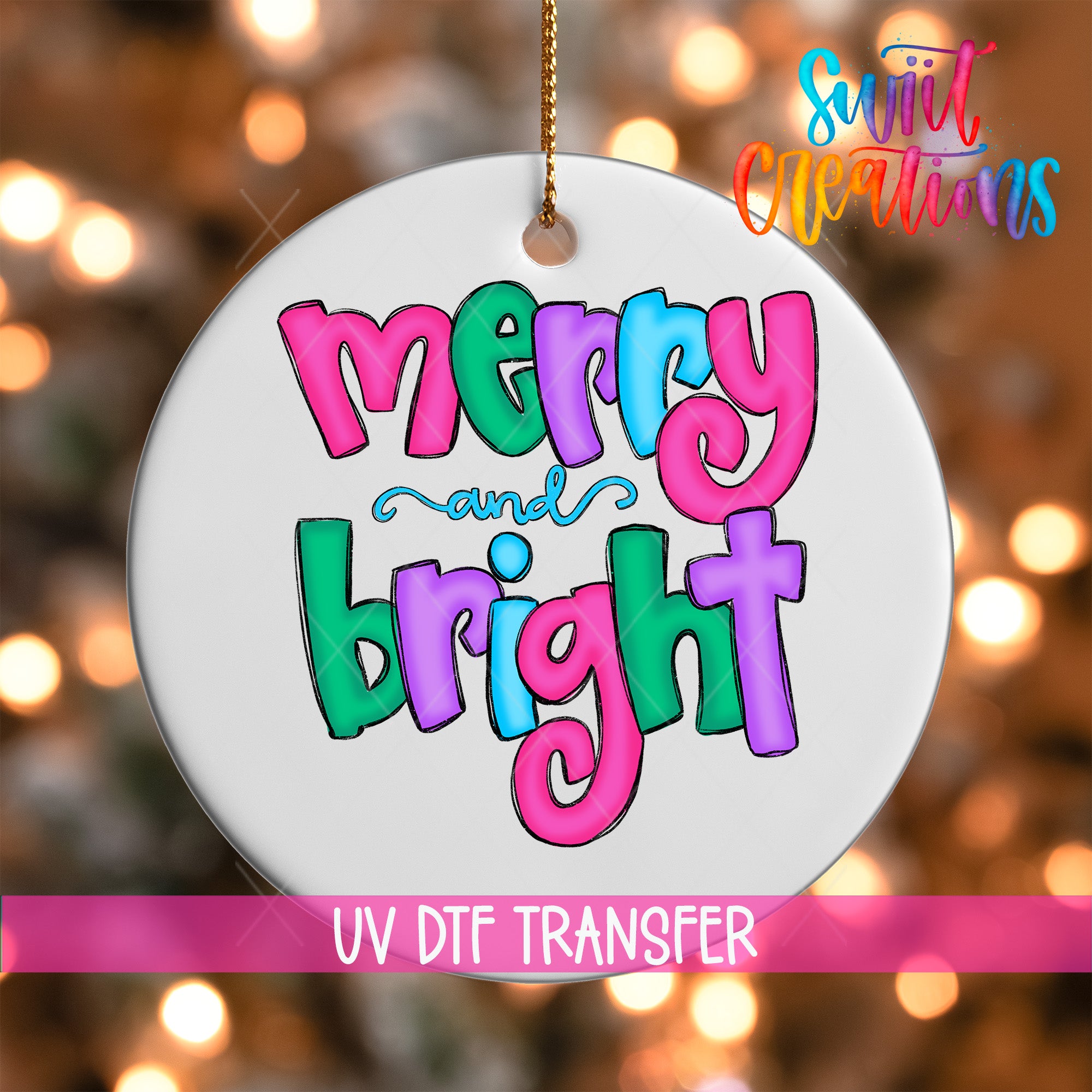 A white ornament with the text "merry and bright" in colorful letters, hanging against a background of blurred lights.