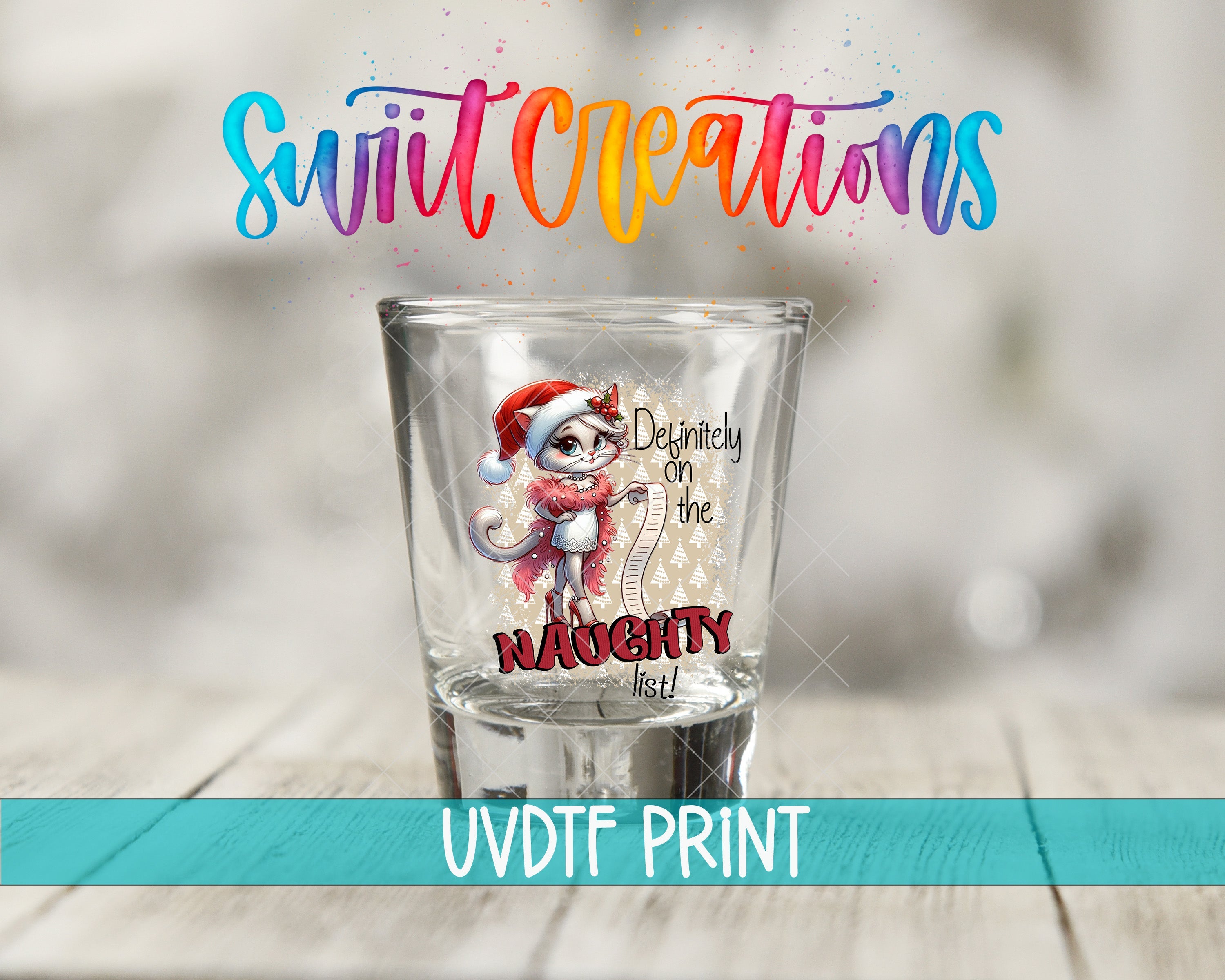 a shot glass with a picture of a santa clause on it