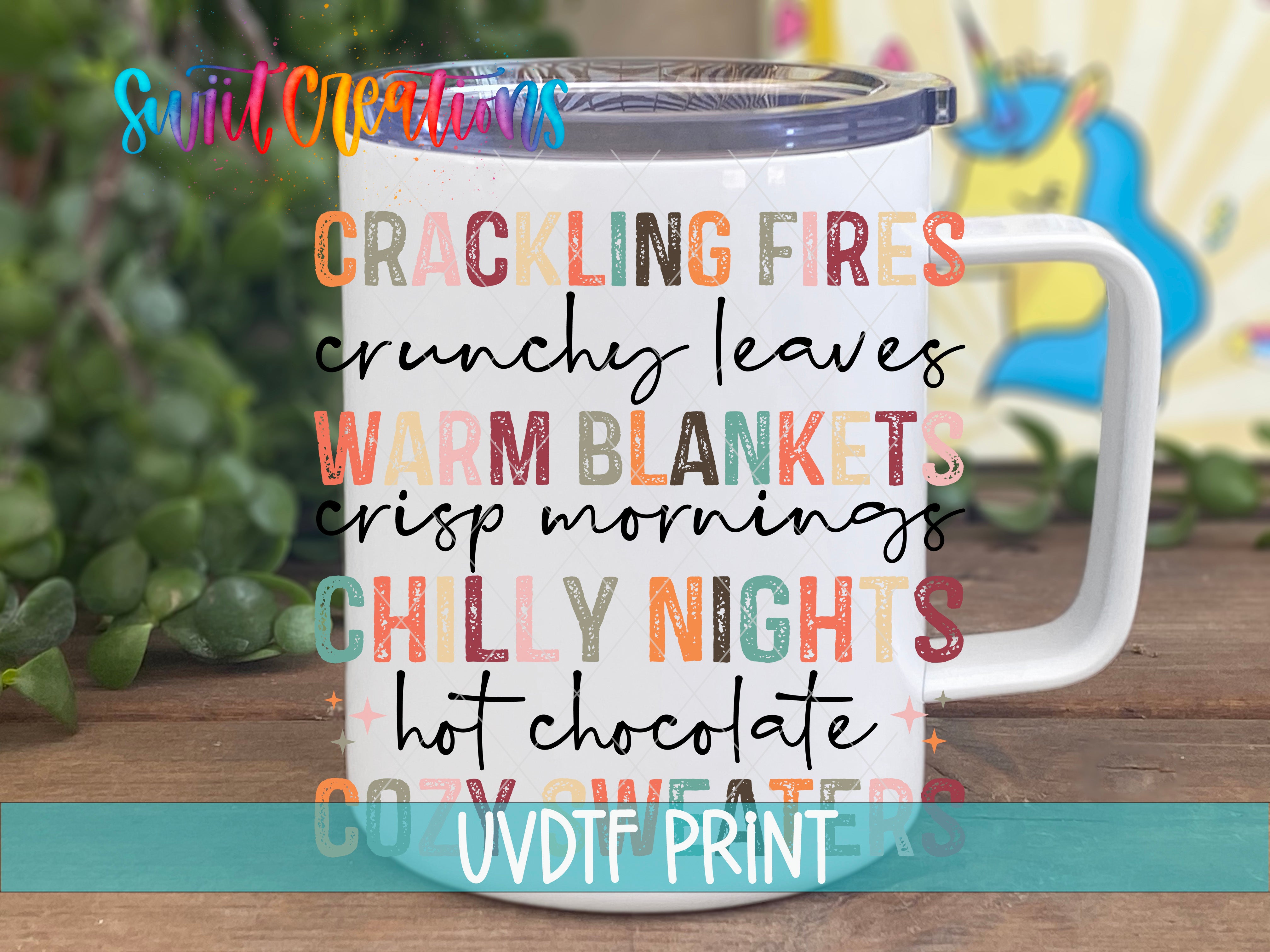 a white coffee mug with colorful words on it