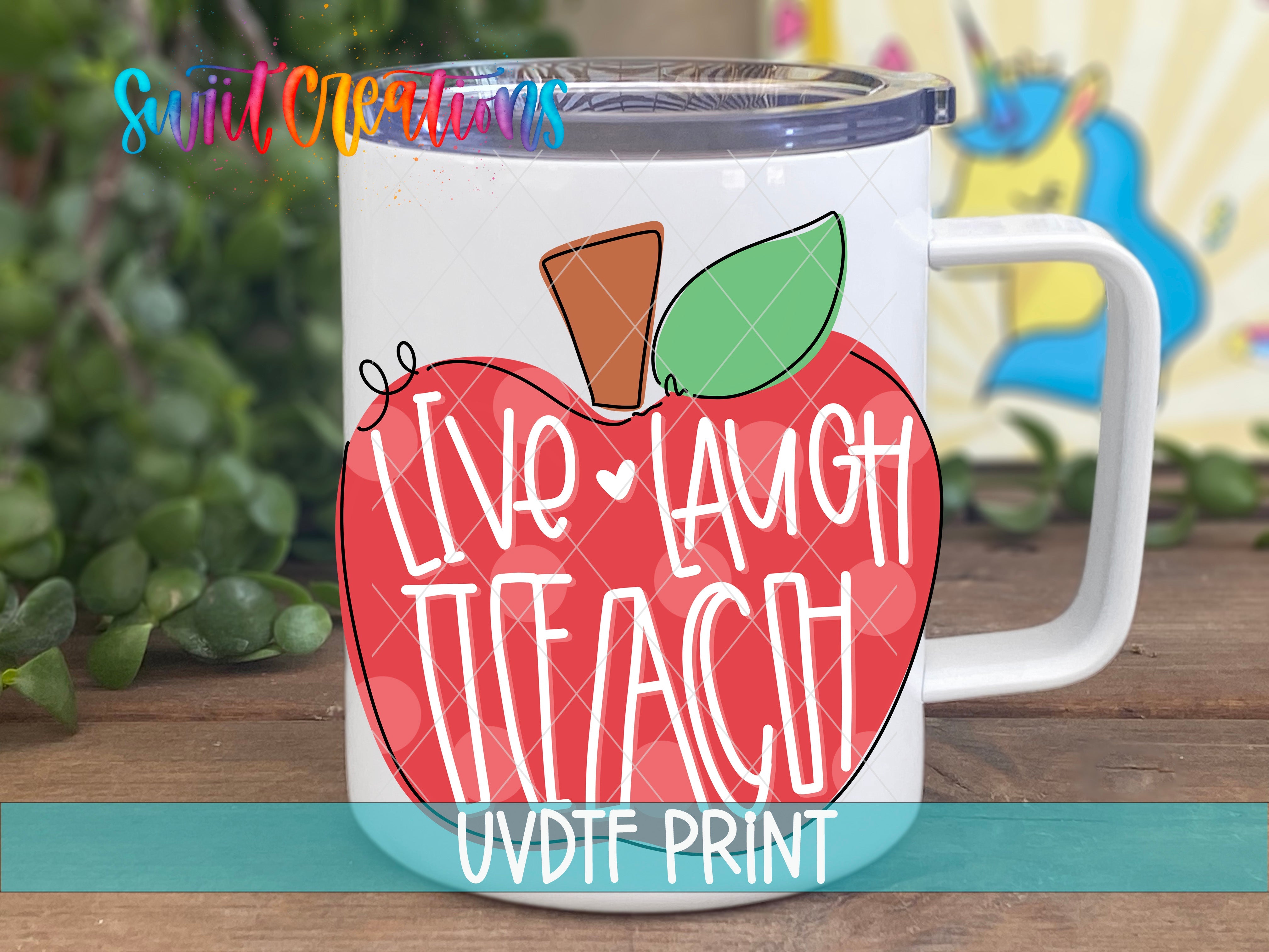 a red apple with the words live laugh teach on it