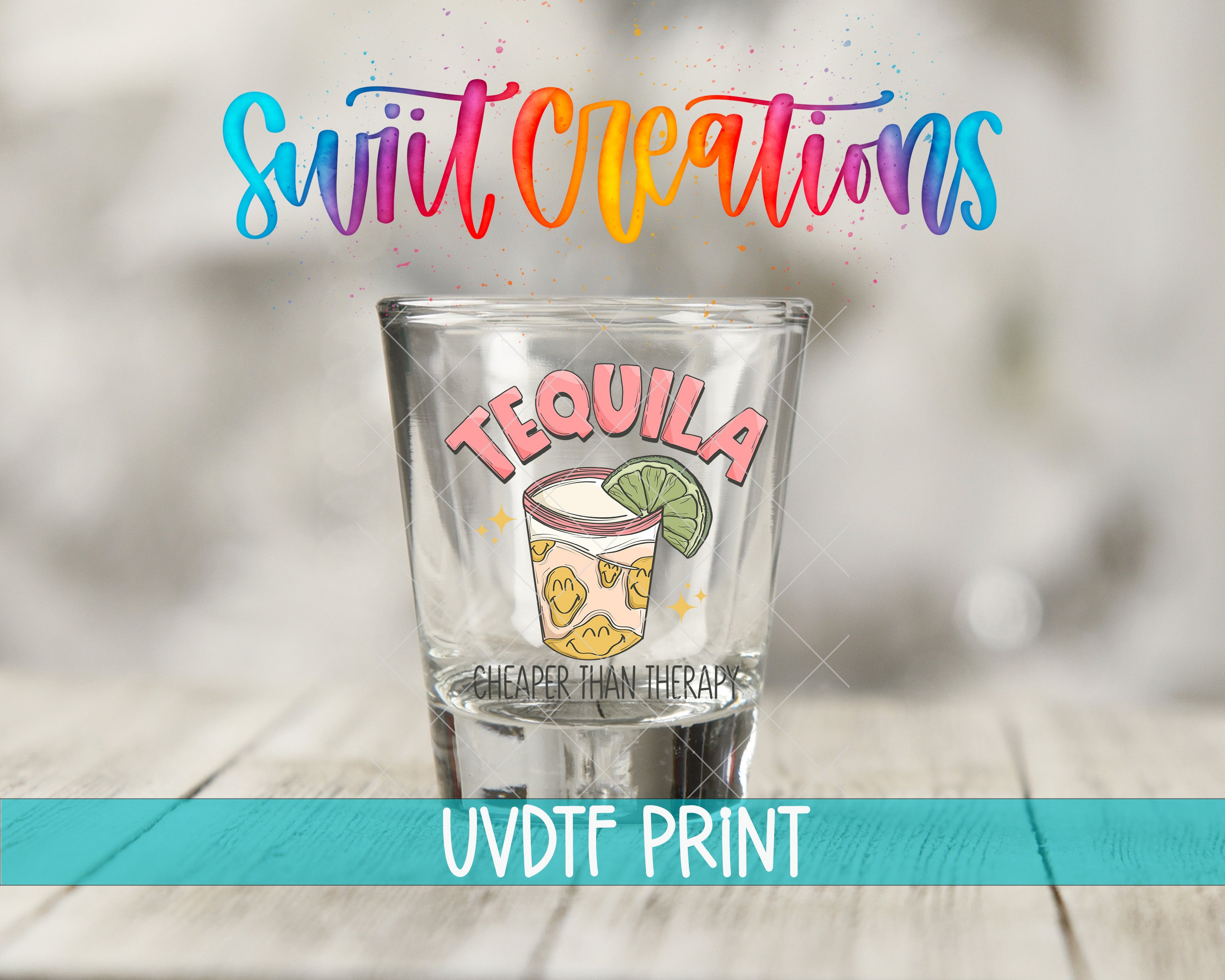 a shot glass sitting on top of a wooden table