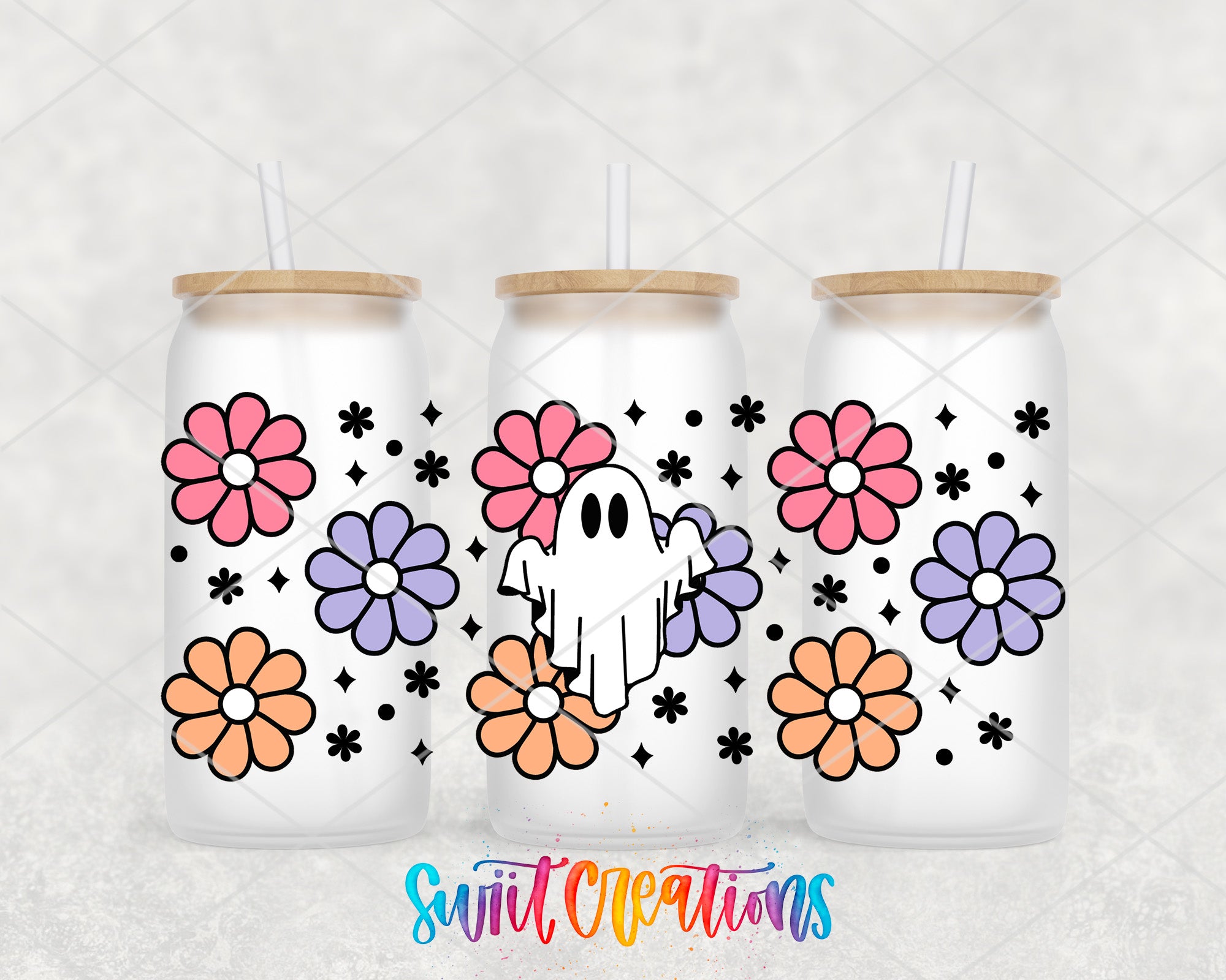 three white tumblers with colorful flower designs and a ghost illustration on them.