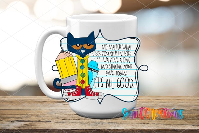 a white coffee mug with a black cat on it