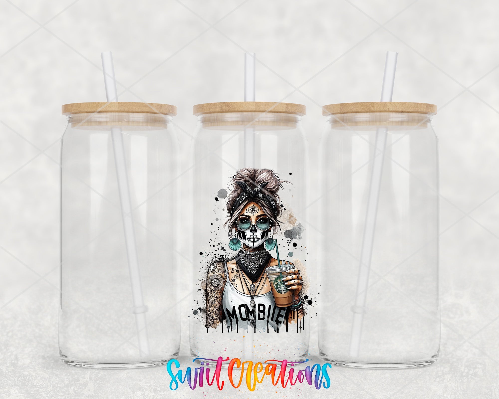 a couple of glass cups with a skeleton on them