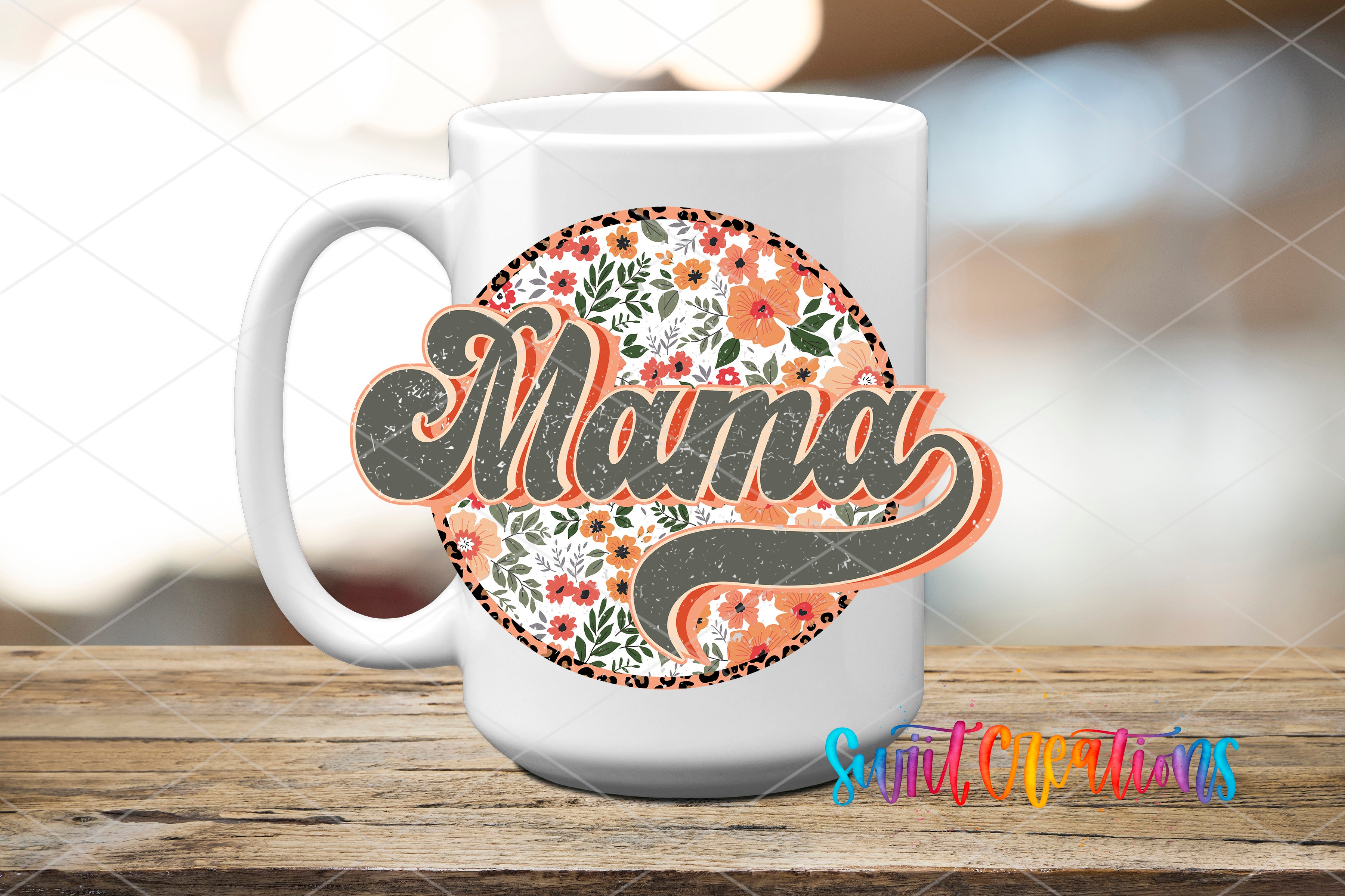 A white ceramic mug with a floral design and the word "Mama" printed on it, placed on a wooden surface.