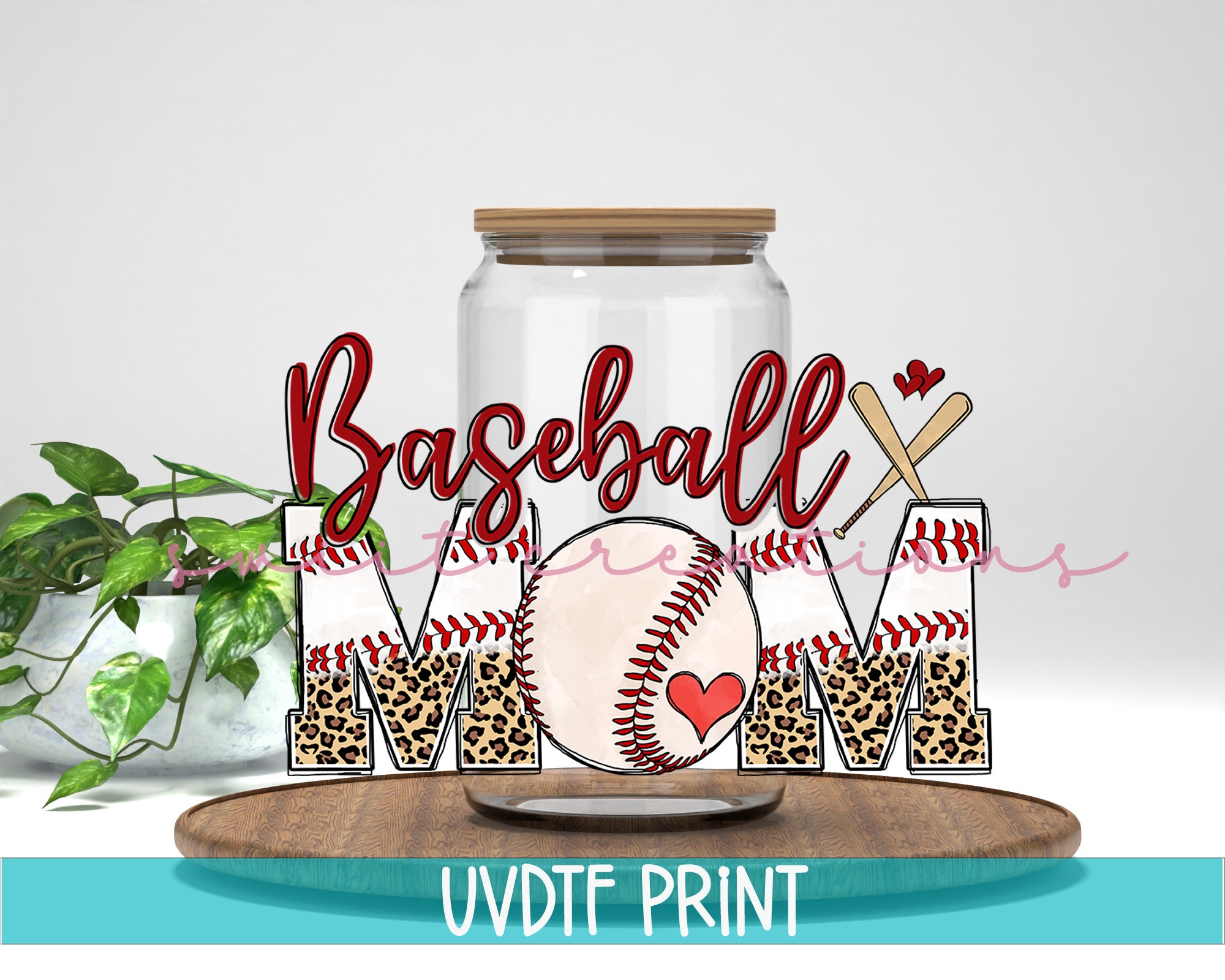 a glass jar with a baseball and leopard print on it