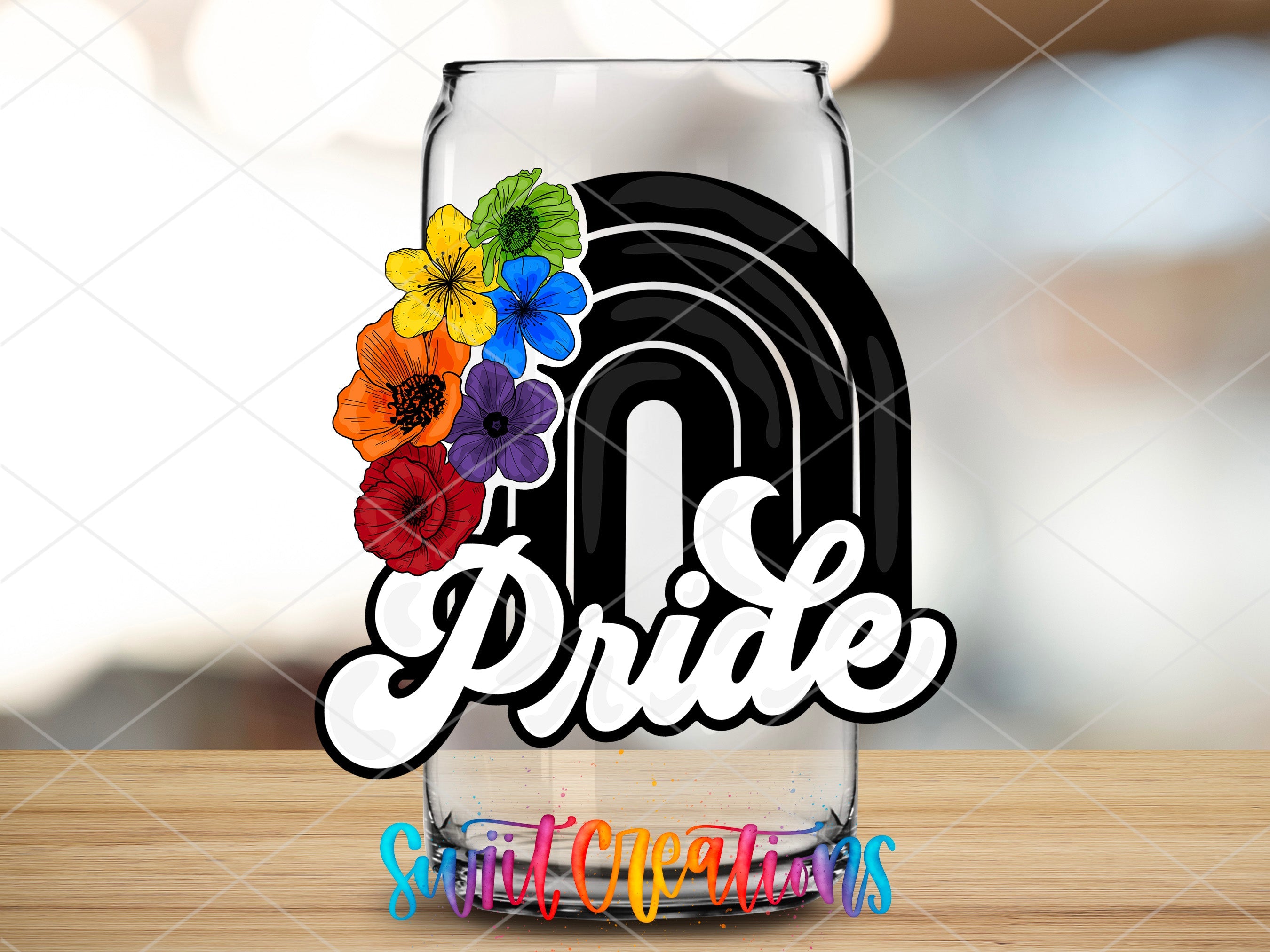 a glass with the word pride painted on it