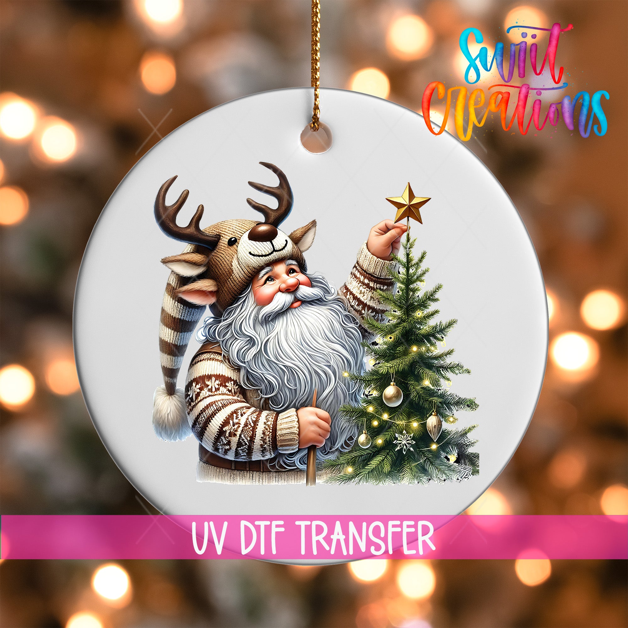 A white ornament featuring a Santa Claus figure holding a star and a Christmas tree, with a blurred background of lights.
