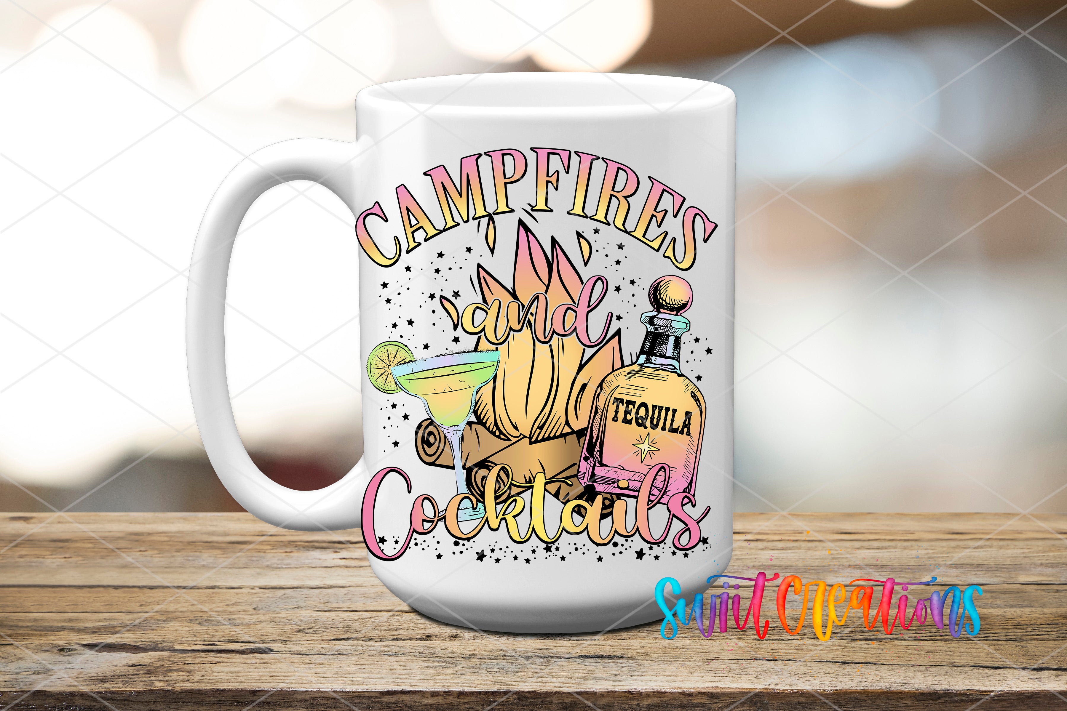 A white ceramic mug with a colorful design featuring a tequila bottle, cocktail glasses, and the text "CAMPFIRE COCKTAILS"