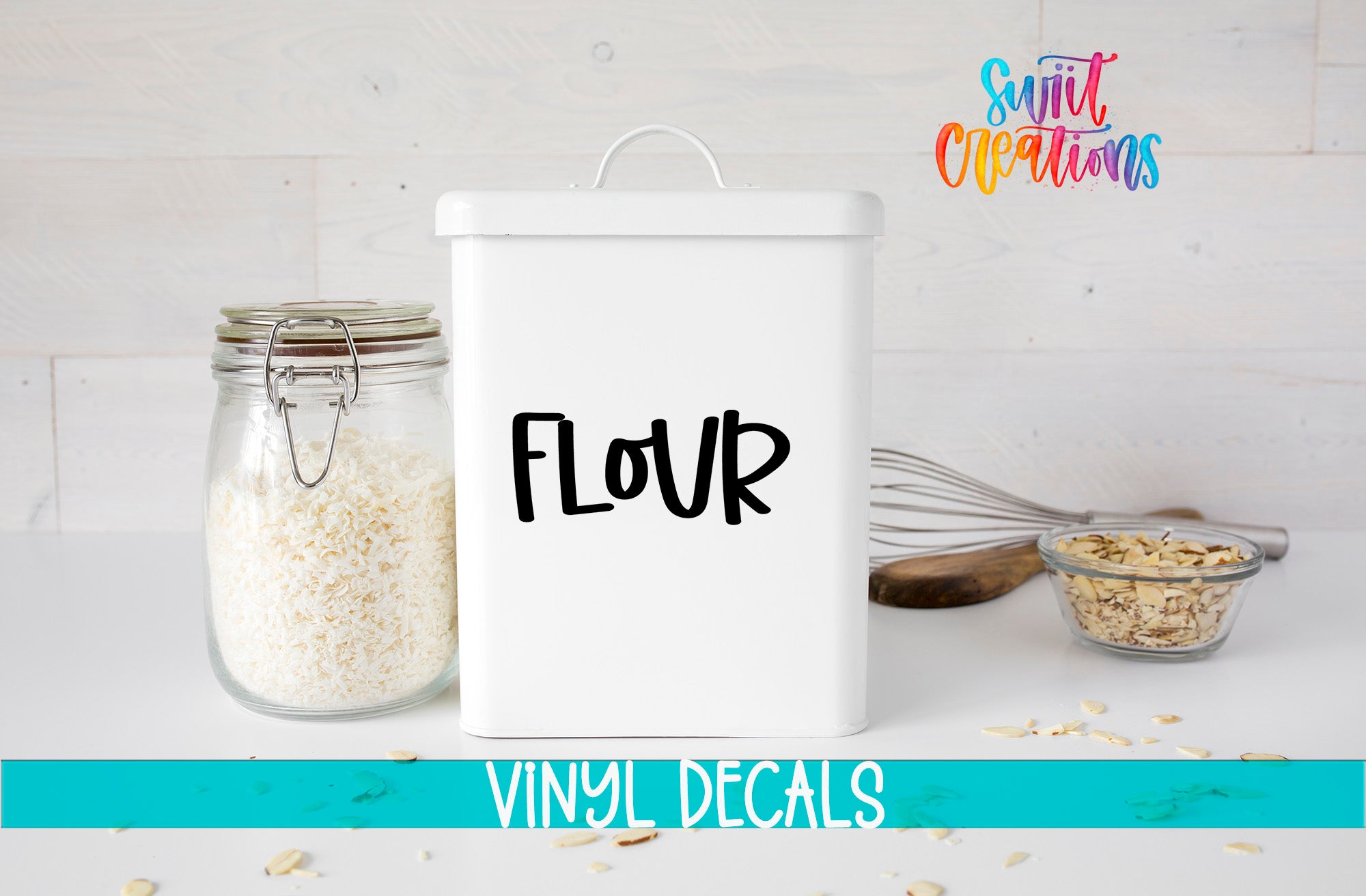 a white container labeled "FLOUR", a glass jar filled with white rice, and a bowl of nuts on a white surface. The text "VINYL DECALS" is visible, suggesting that the image may be a product advertisement or a collection of kitchen-related images.