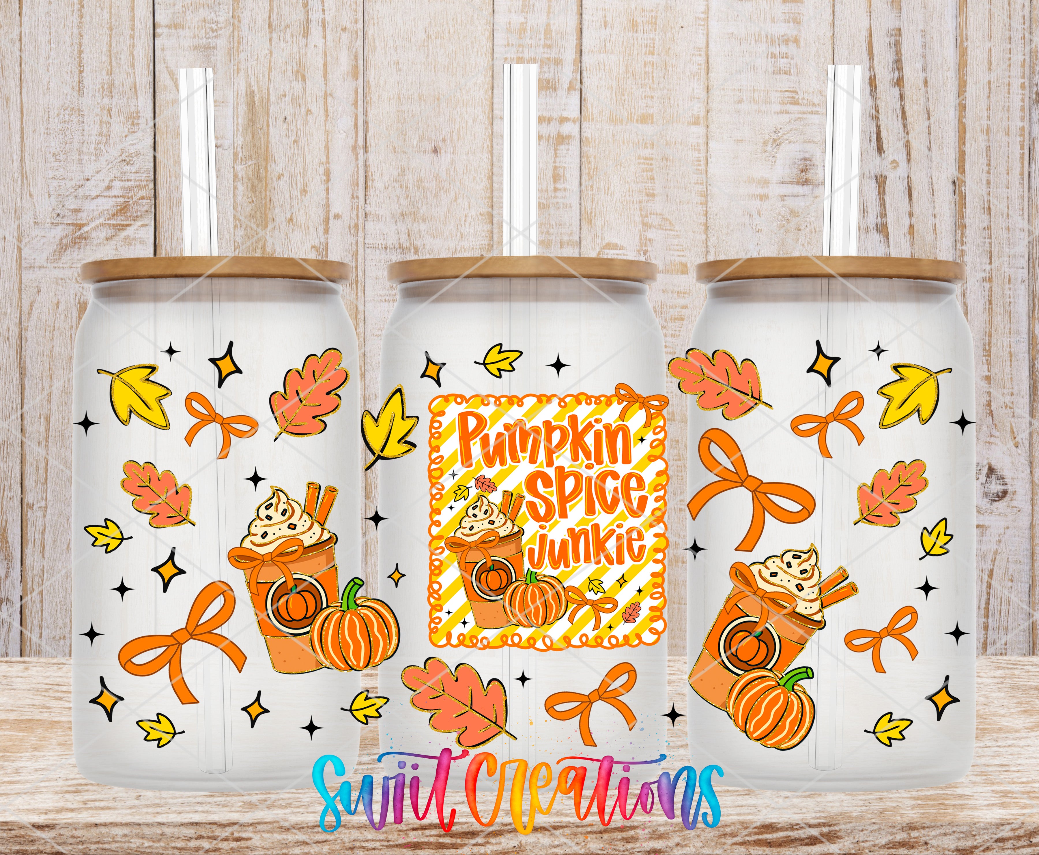 three glass tumblers with pumpkin and autumn-themed designs, including leaves, pumpkins, and a pumpkin spice junkie.