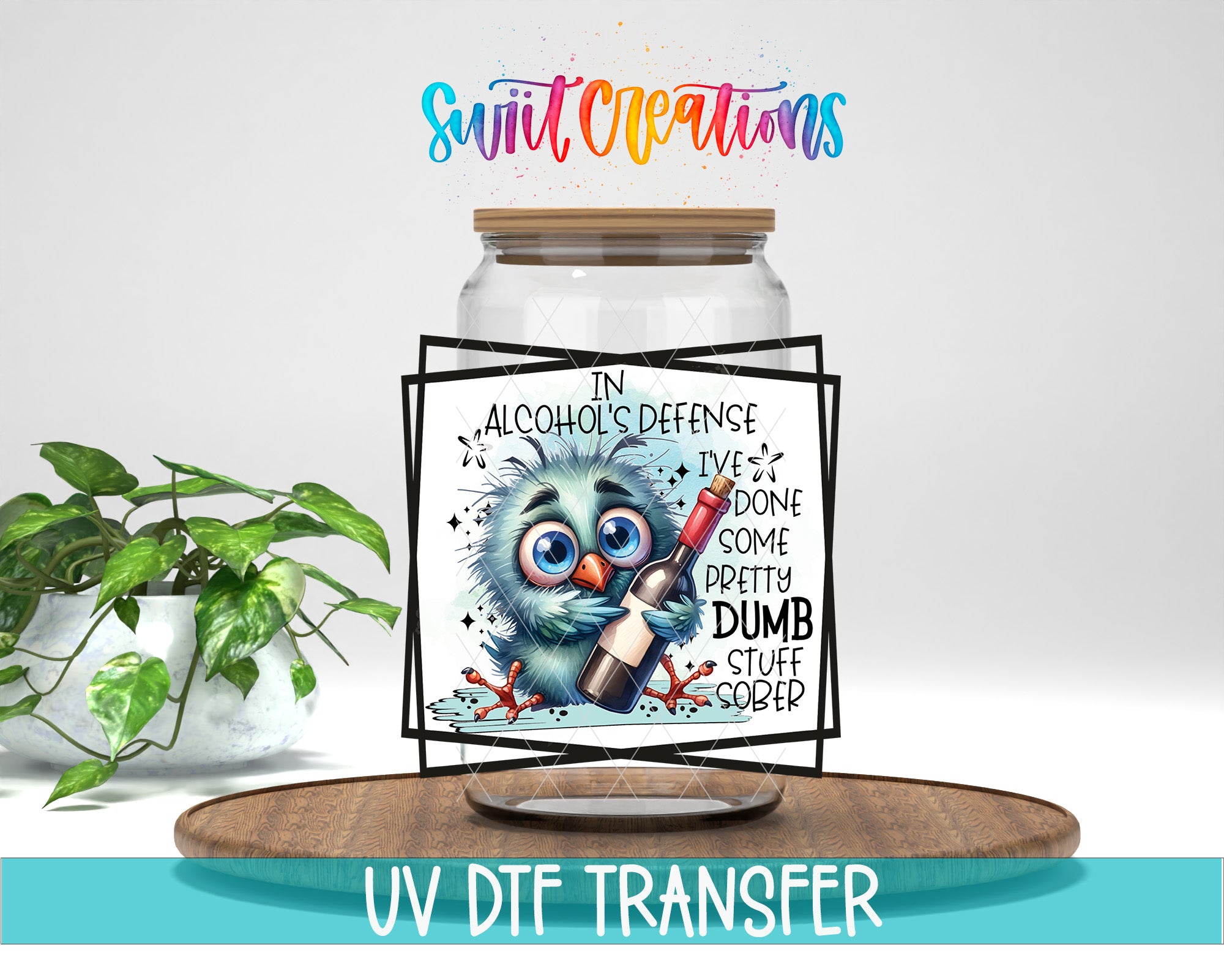 A digital illustration of a blue bird holding a bottle of alcohol, with text that reads "In alcohol's defense I've done something pretty dumb stuff sober". The image is framed and displayed on a wooden surface, with a potted plant in the background.