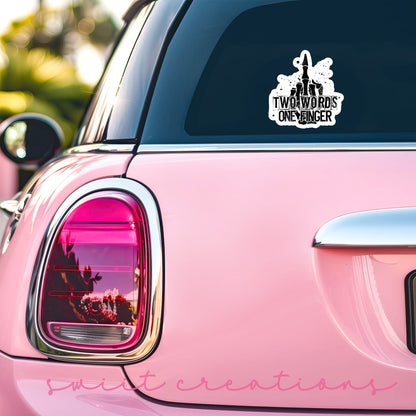 Two Words One Finger sticker on the back window of a pink car