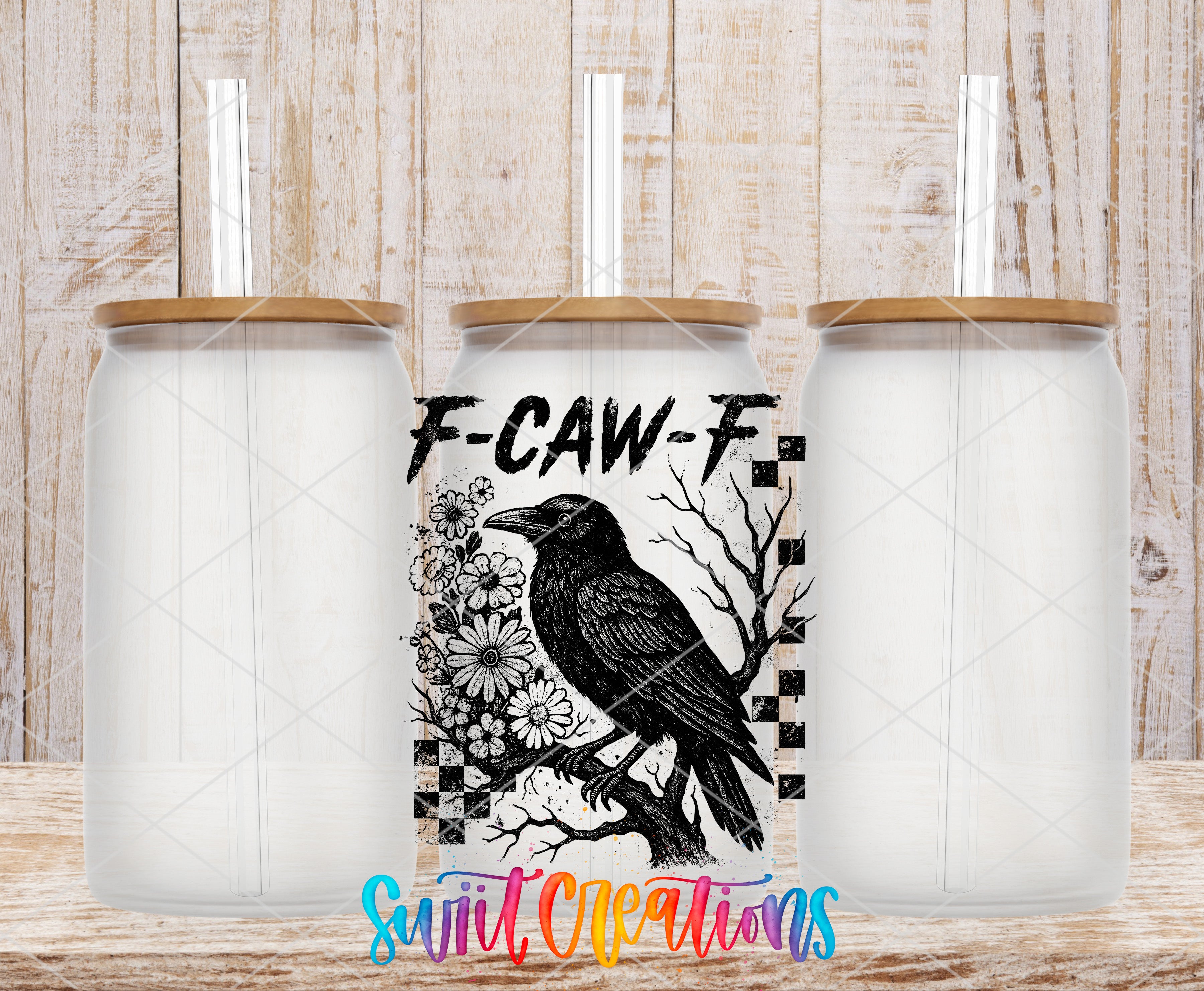 three clear glass jars with wooden lids, each with a straw sticking out of the top. The jars are arranged in a row, and there is a black and white illustration of a bird perched on a branch in the center of the image.