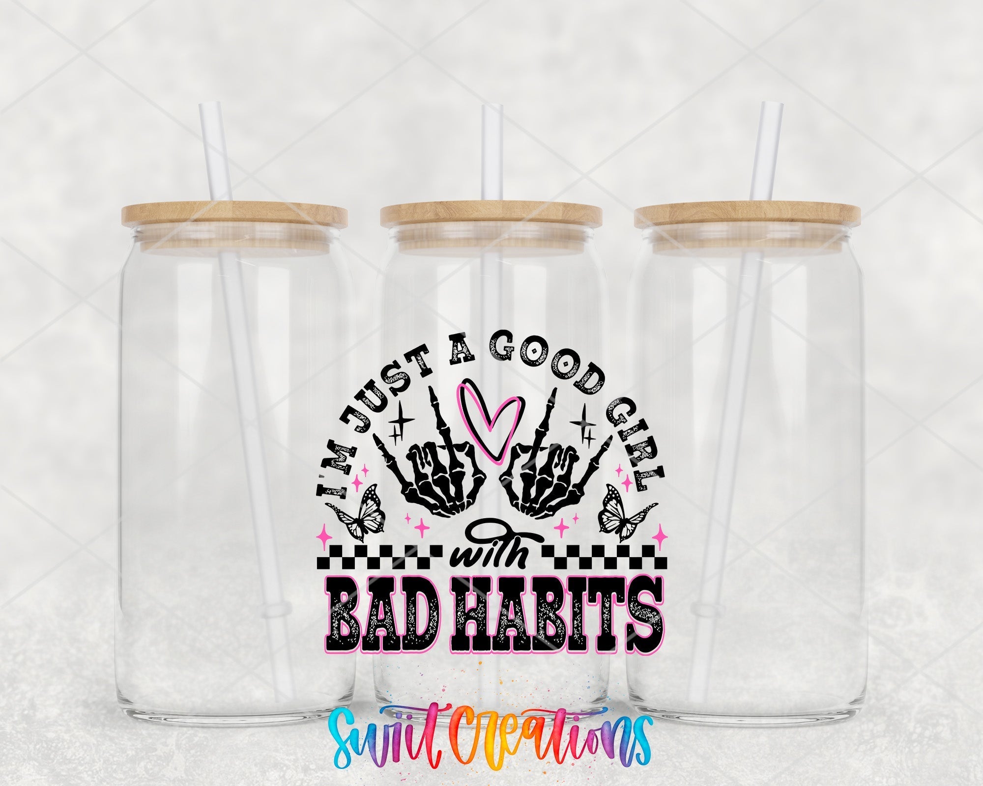 a couple of plastic cups with straws in them