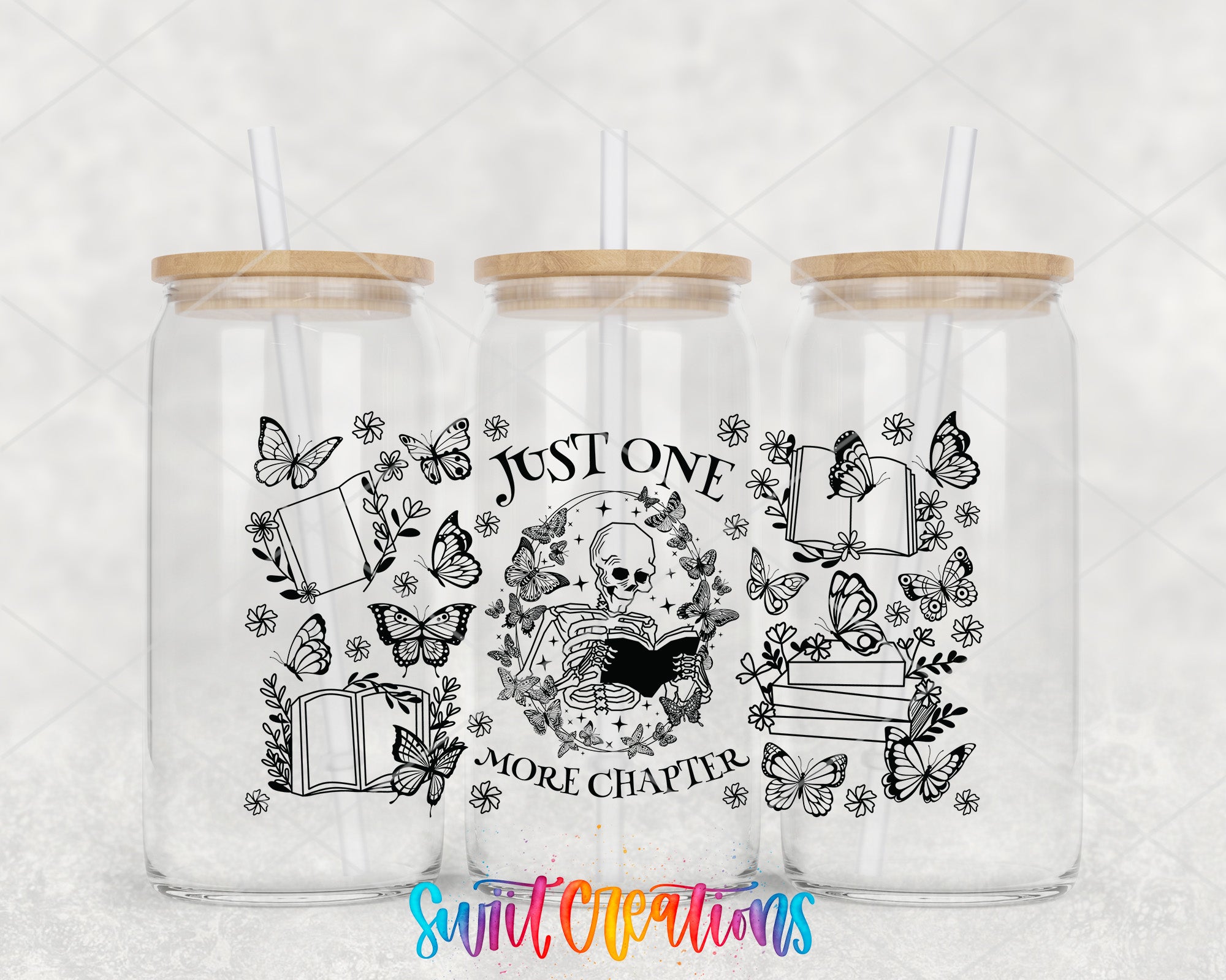 three clear glass tumblers with wooden lids, each adorned with a black and white illustration of a skeleton reading a book surrounded by butterflies. The text on the tumblers reads "JUST ONE MORE CHAPTER" and "Just One," suggesting a theme of reading and storytelling.